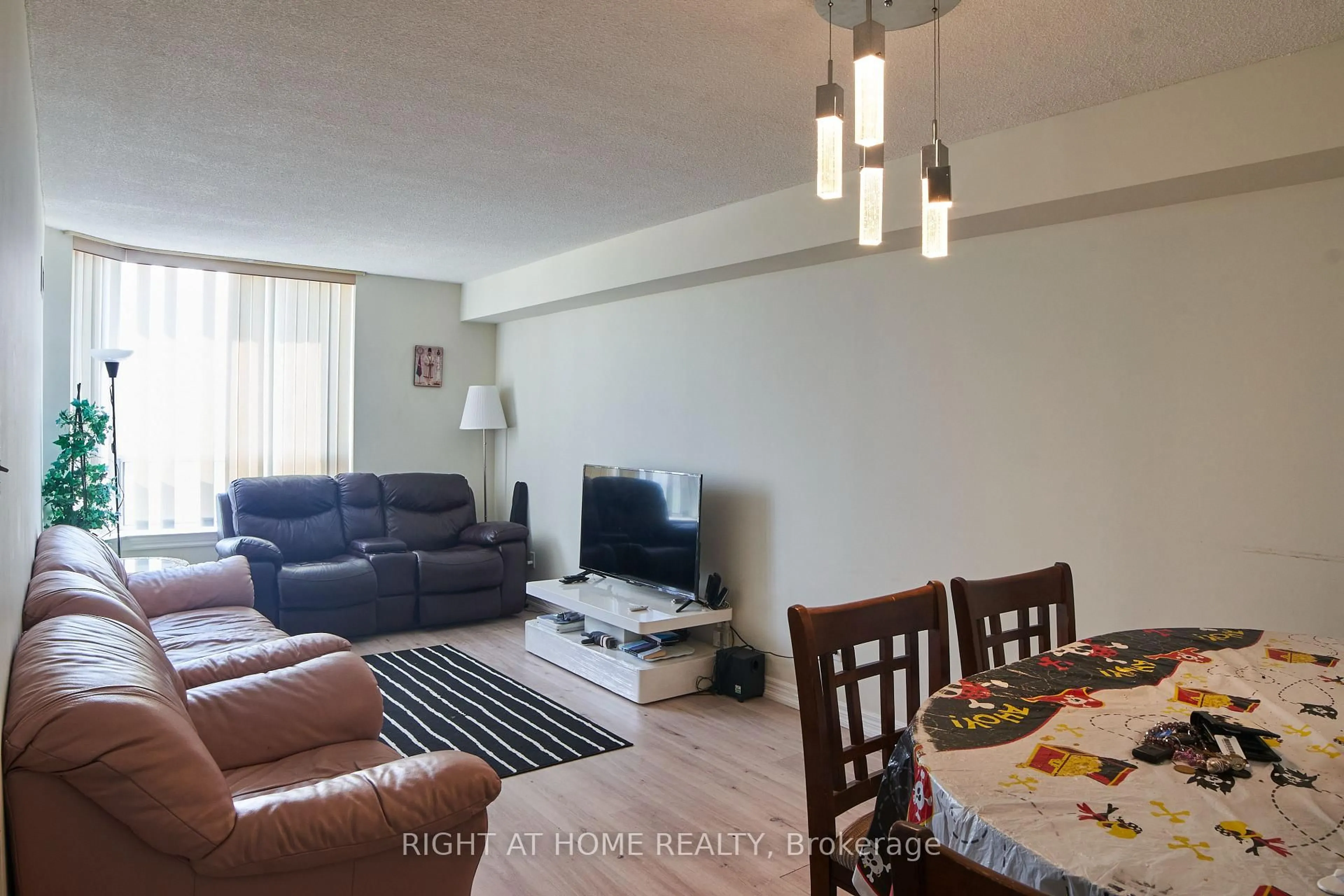 Living room with furniture, unknown for 1700 Eglinton Ave #609, Toronto Ontario M4A 2X4