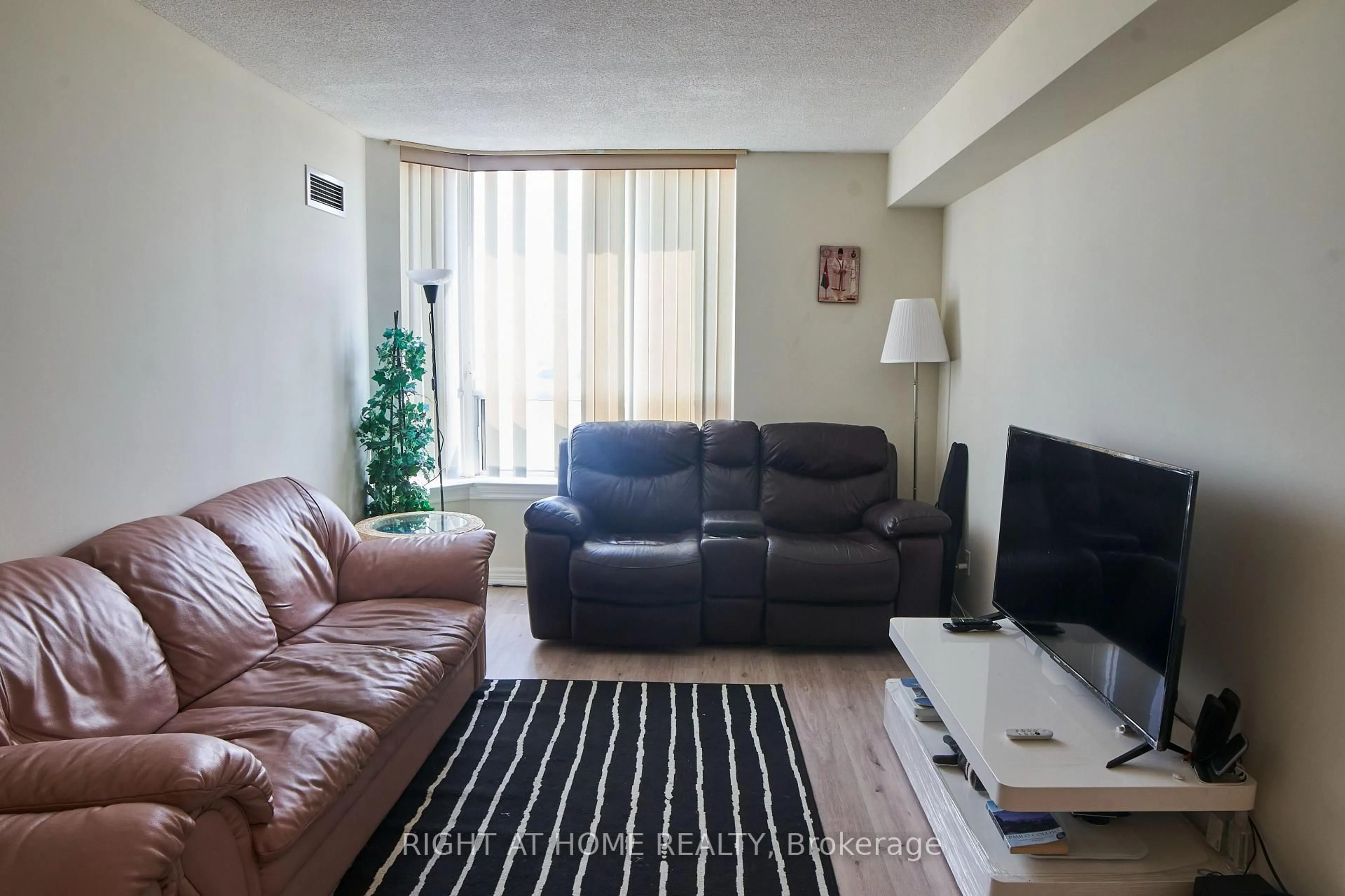 Living room with furniture, unknown for 1700 Eglinton Ave #609, Toronto Ontario M4A 2X4