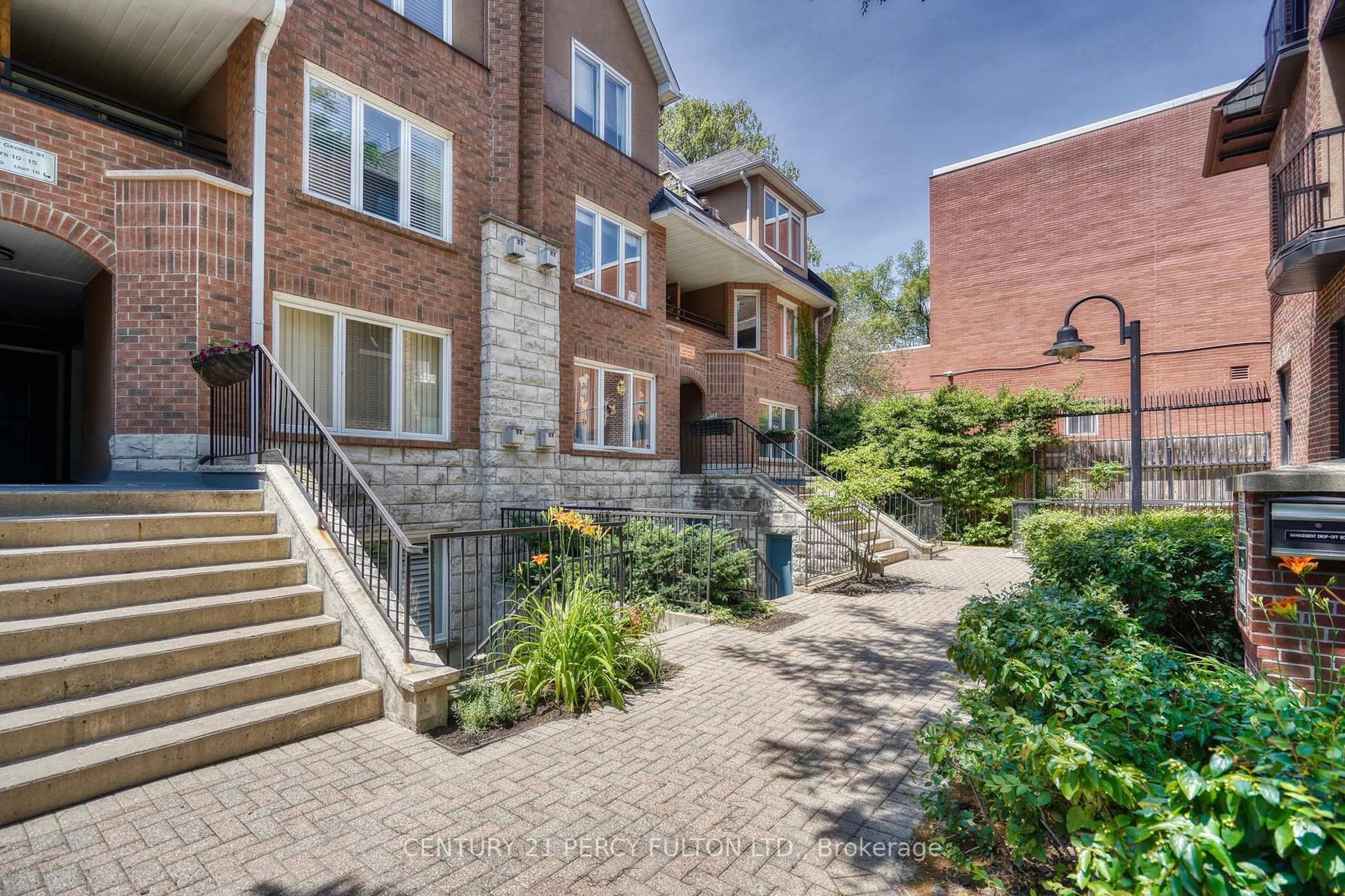 Home with brick exterior material, street for 232 St George St #TH22, Toronto Ontario M5R 2N5