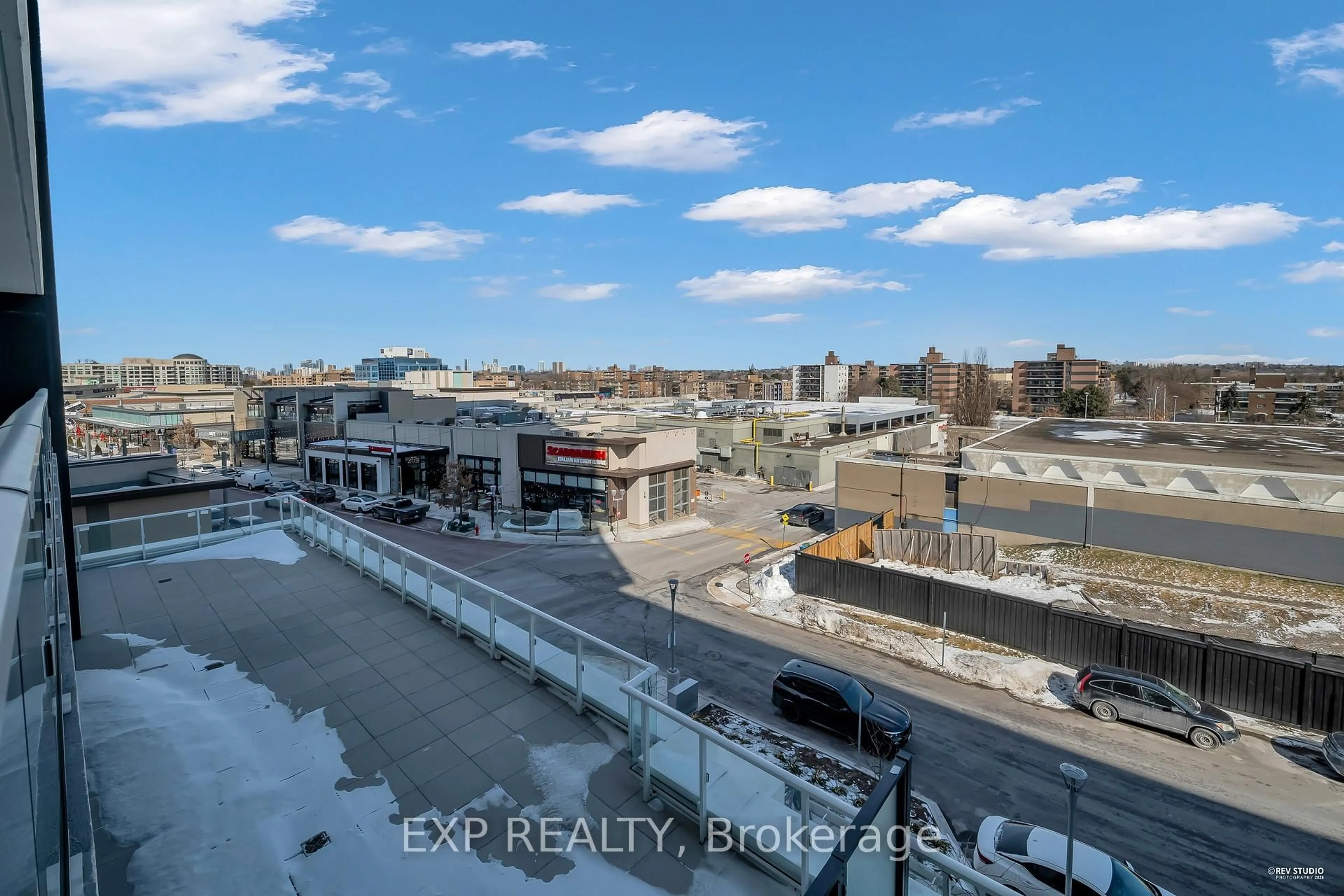 A pic from outside/outdoor area/front of a property/back of a property/a pic from drone, city buildings view from balcony for 50 Oneil Rd #313, Toronto Ontario M3C 0R2