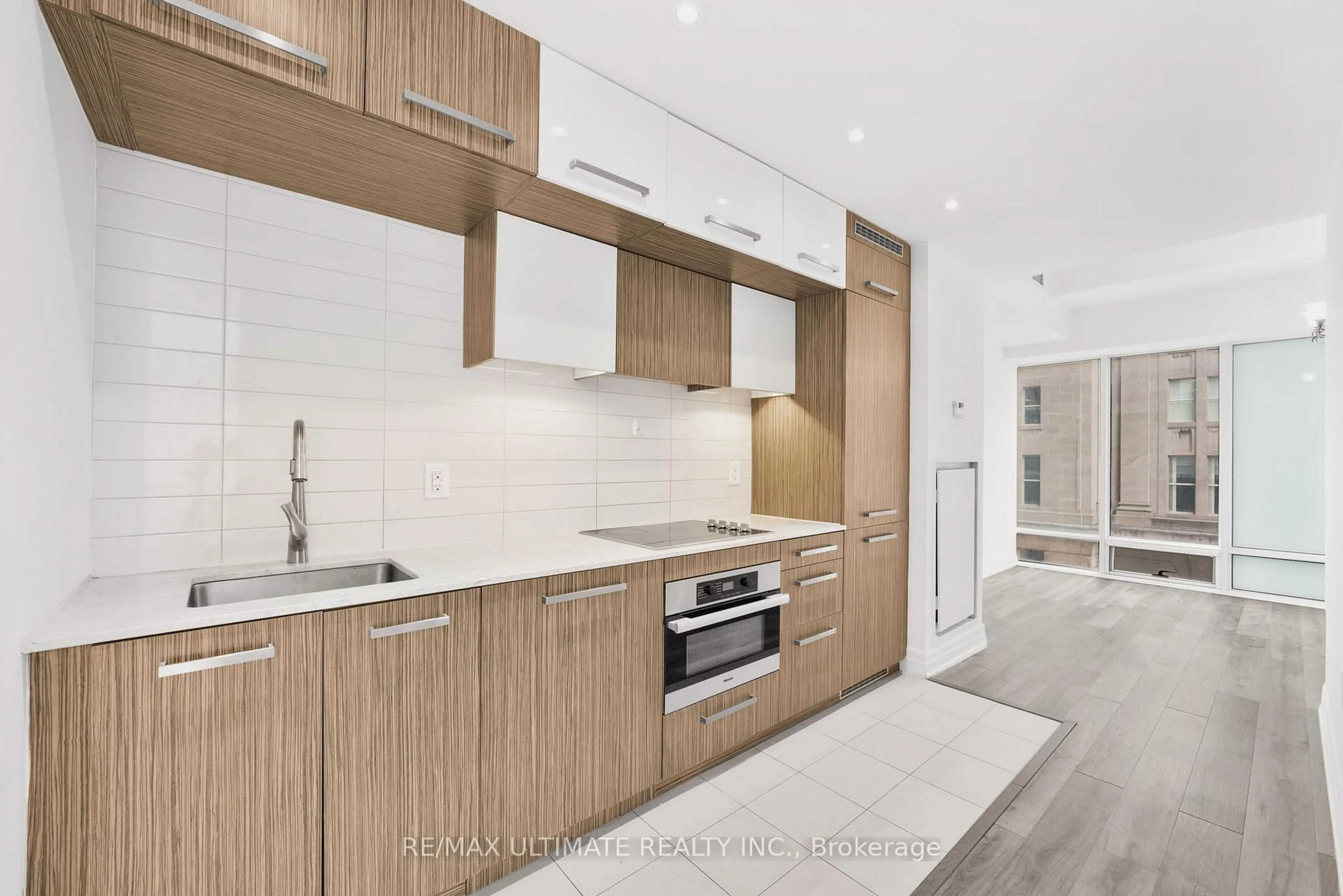 Contemporary kitchen, wood/laminate floor for 8 The Esplanade St #506, Toronto Ontario M5E 0A6