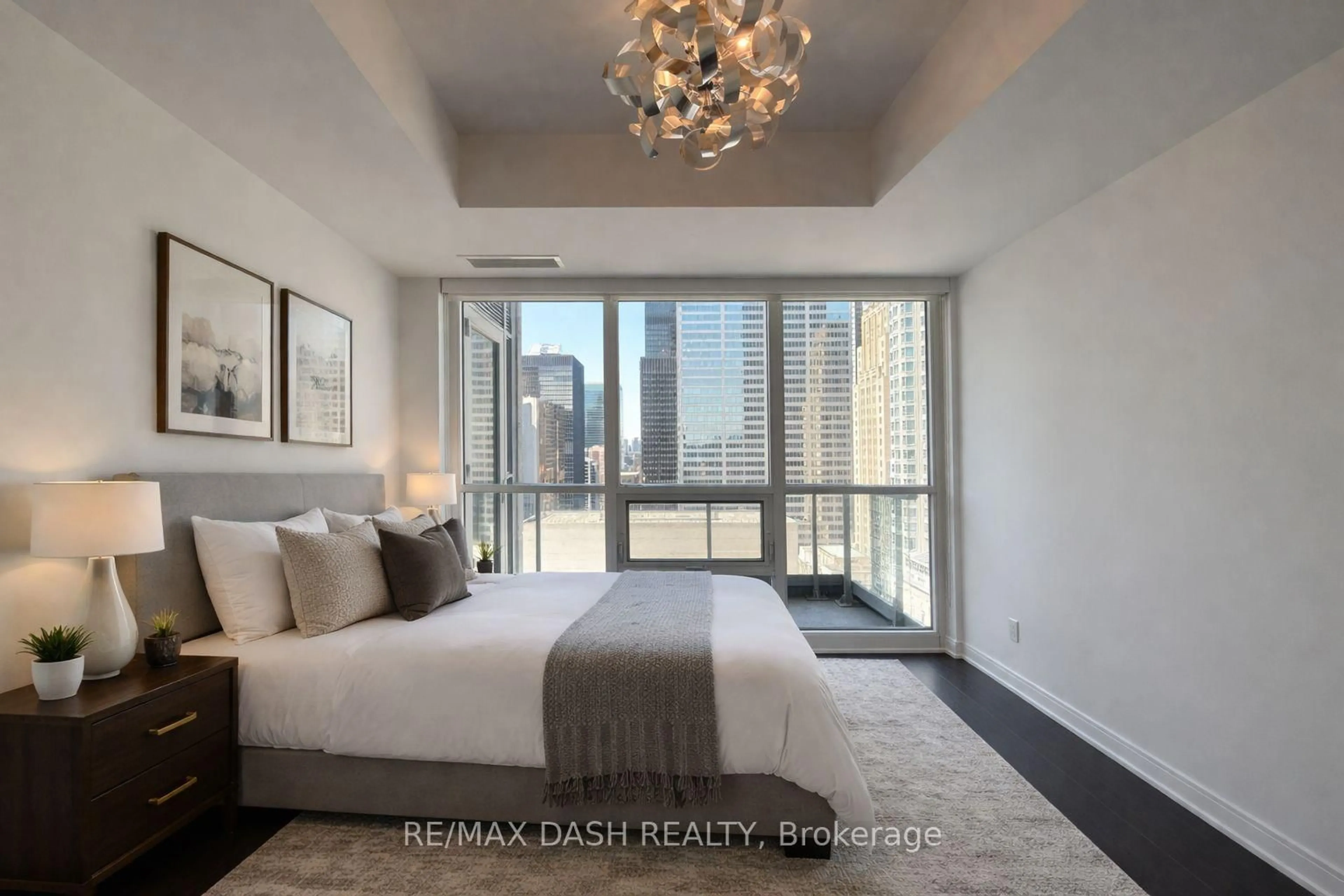 Bedroom with bed, unknown for 88 Scott St #2501, Toronto Ontario M5E 0A9