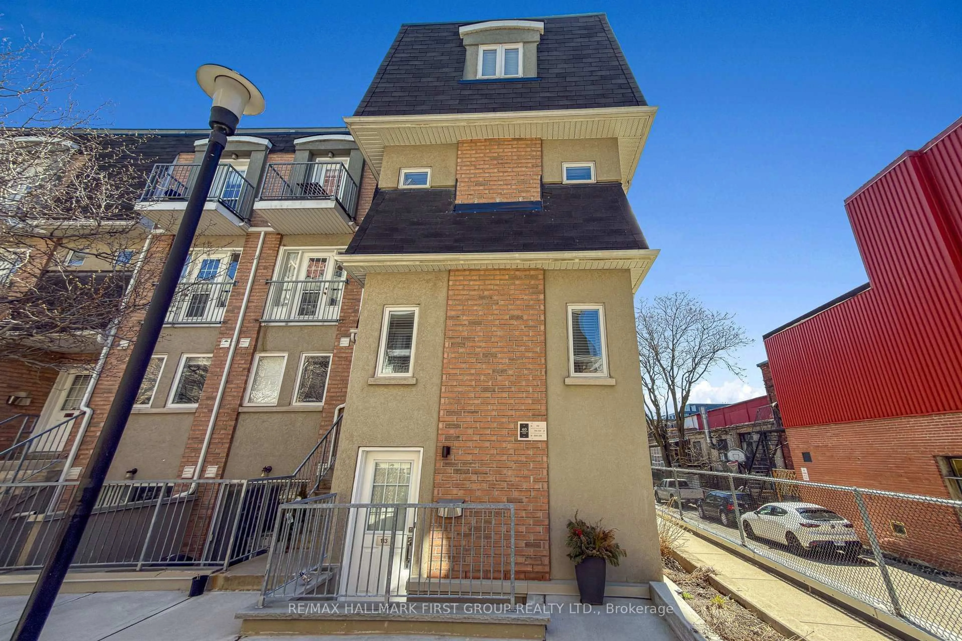 Home with brick exterior material, street for 40 Merchant Lane #113, Toronto Ontario M6P 4J6