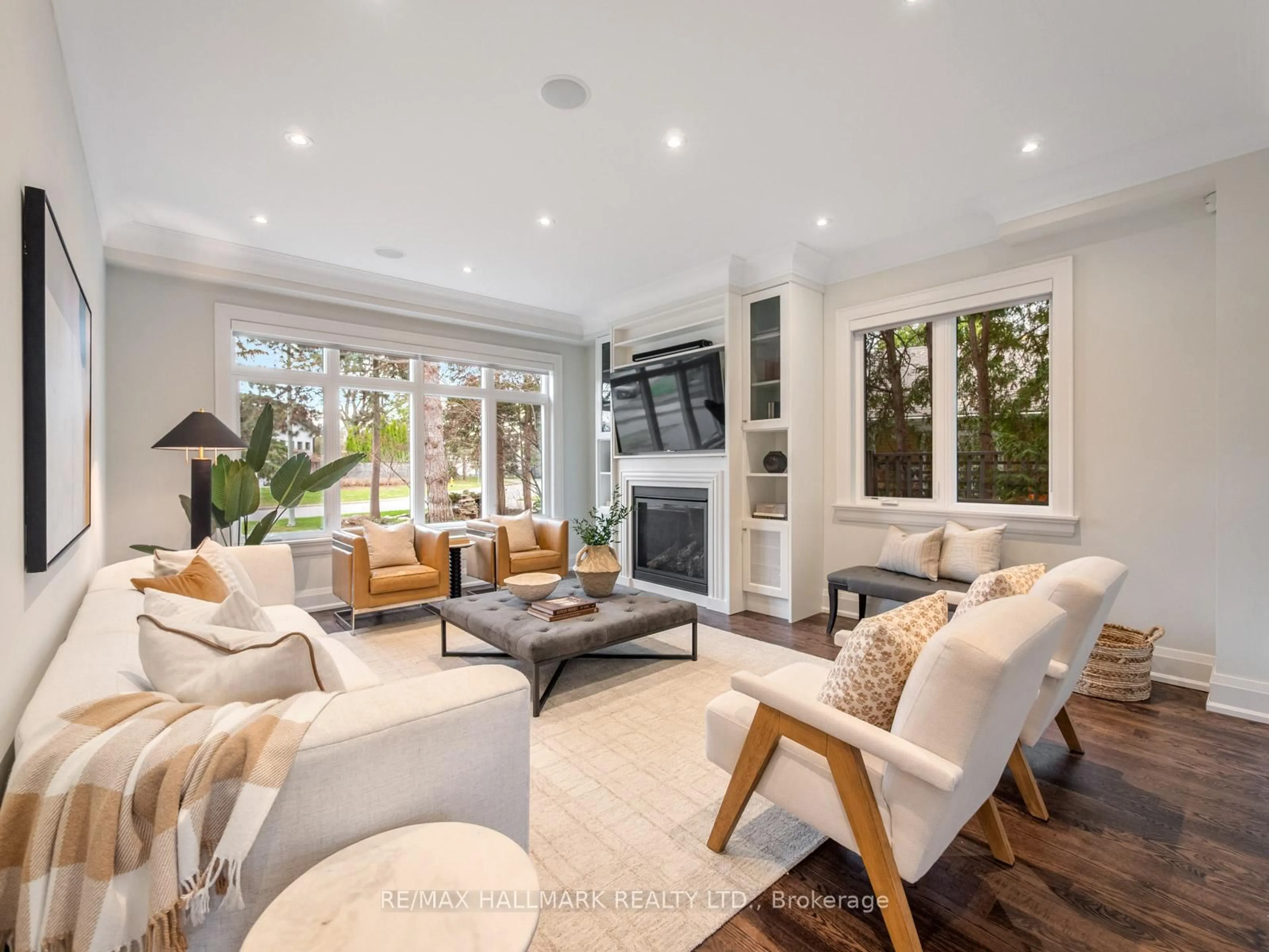 Living room with furniture, unknown for 48 Paperbirch Dr, Toronto Ontario M3C 2E7