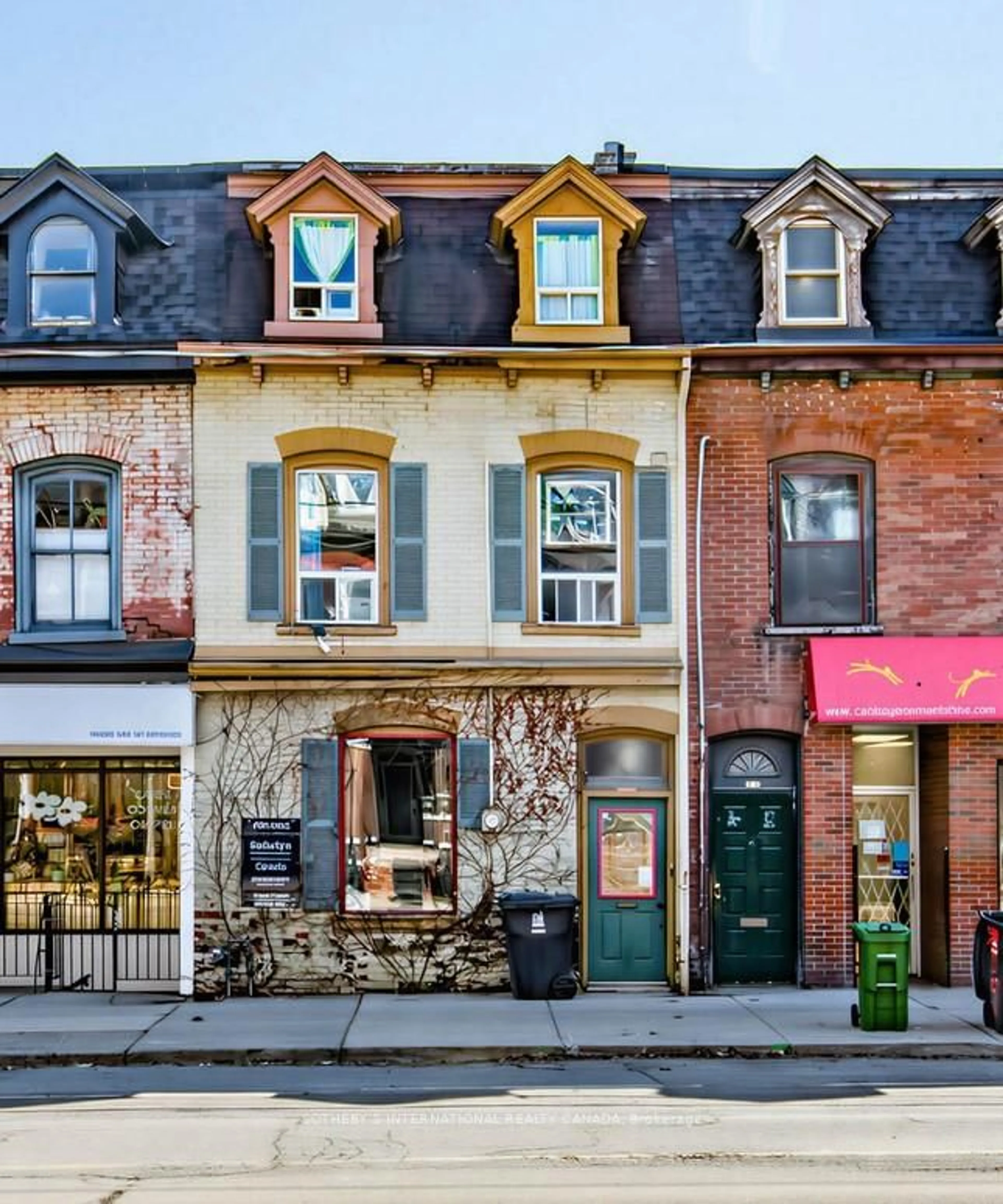 Home with brick exterior material, street for 243 Gerrard St, Toronto Ontario M5A 2G1