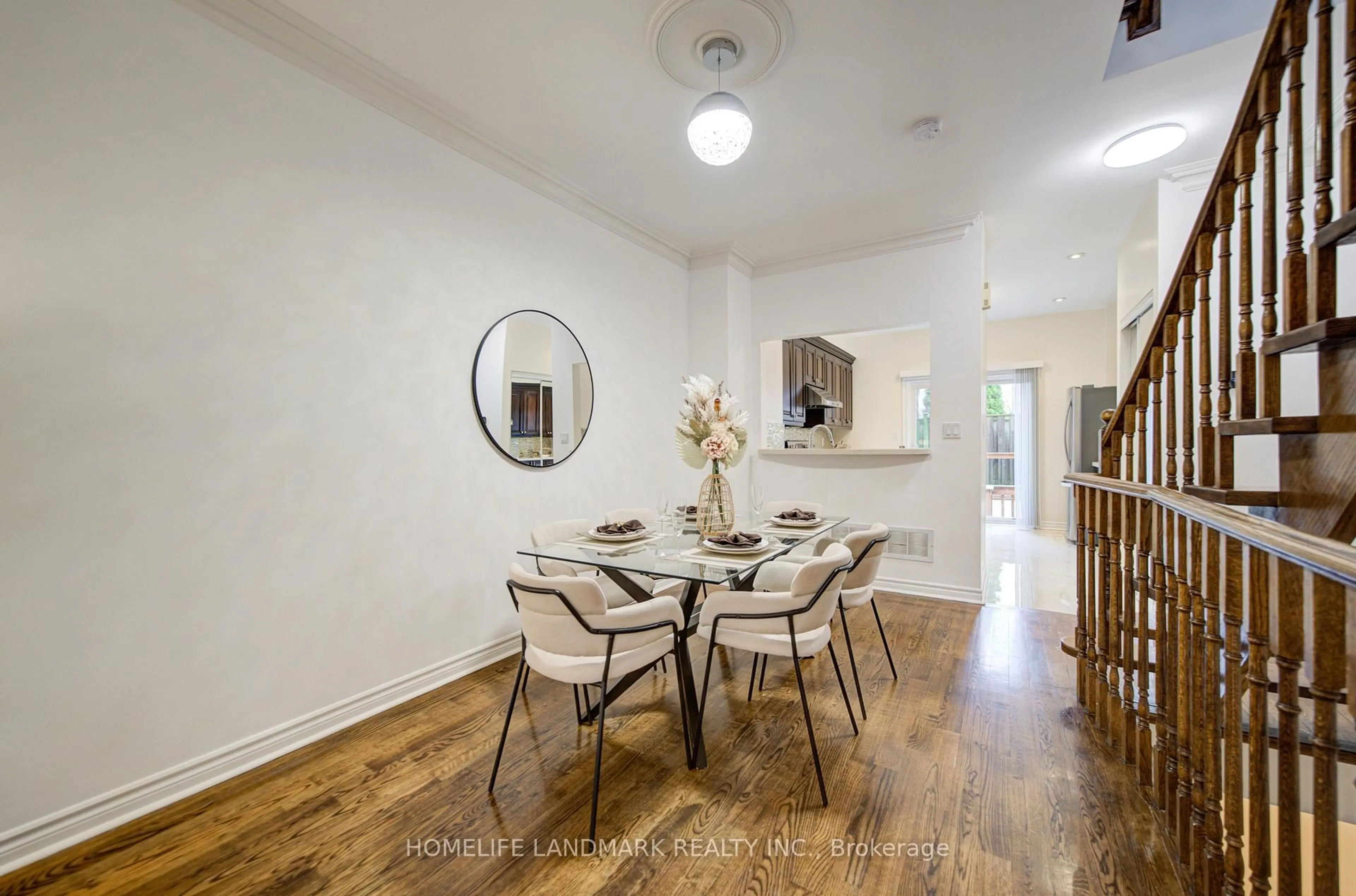 Dining room, wood/laminate floor for 11 Humphrey Gate, Toronto Ontario M3C 4B8