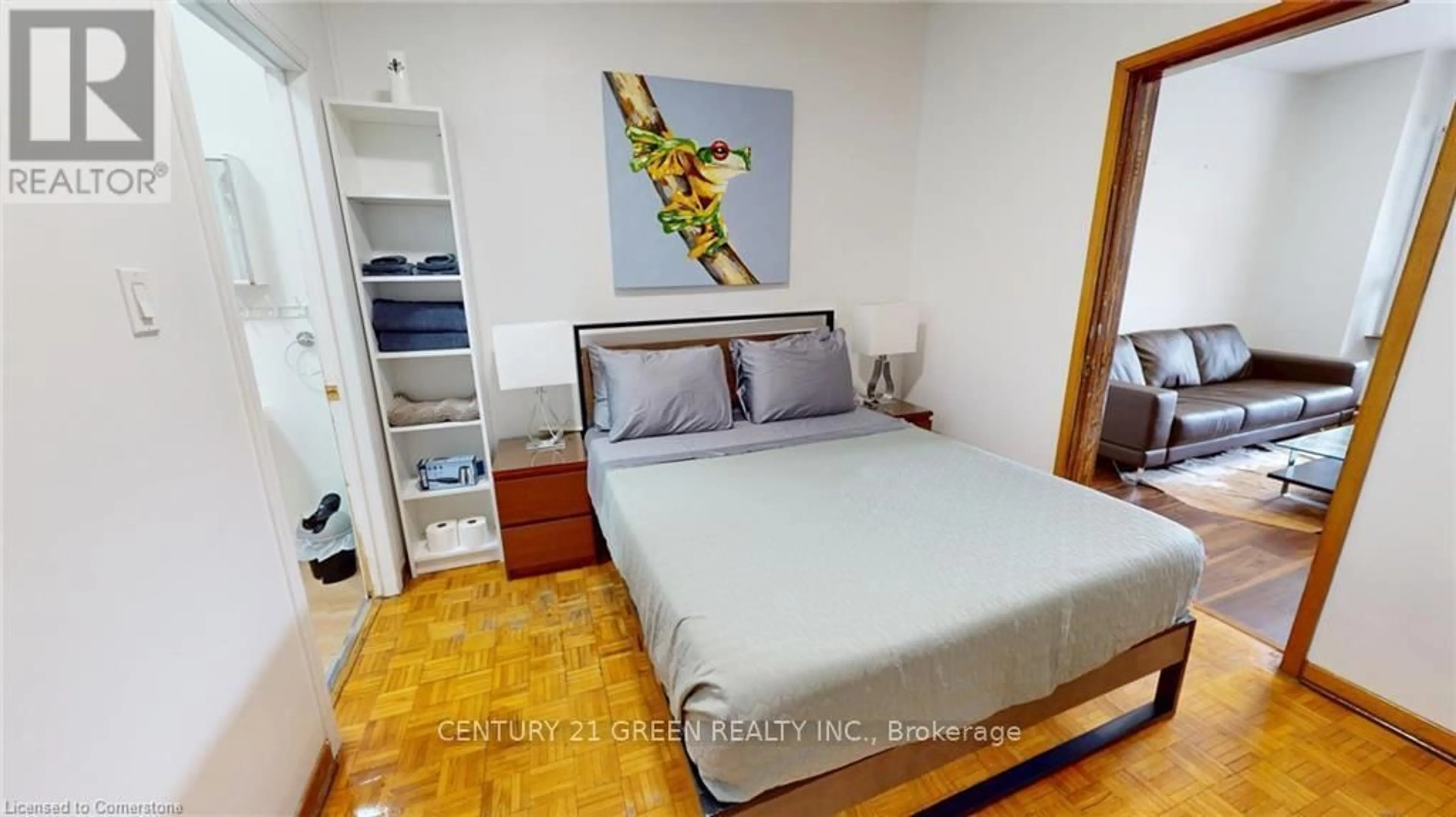 Bedroom with bed, wood/laminate floor for 36 Mitchell Ave, Toronto Ontario M6J 1B9