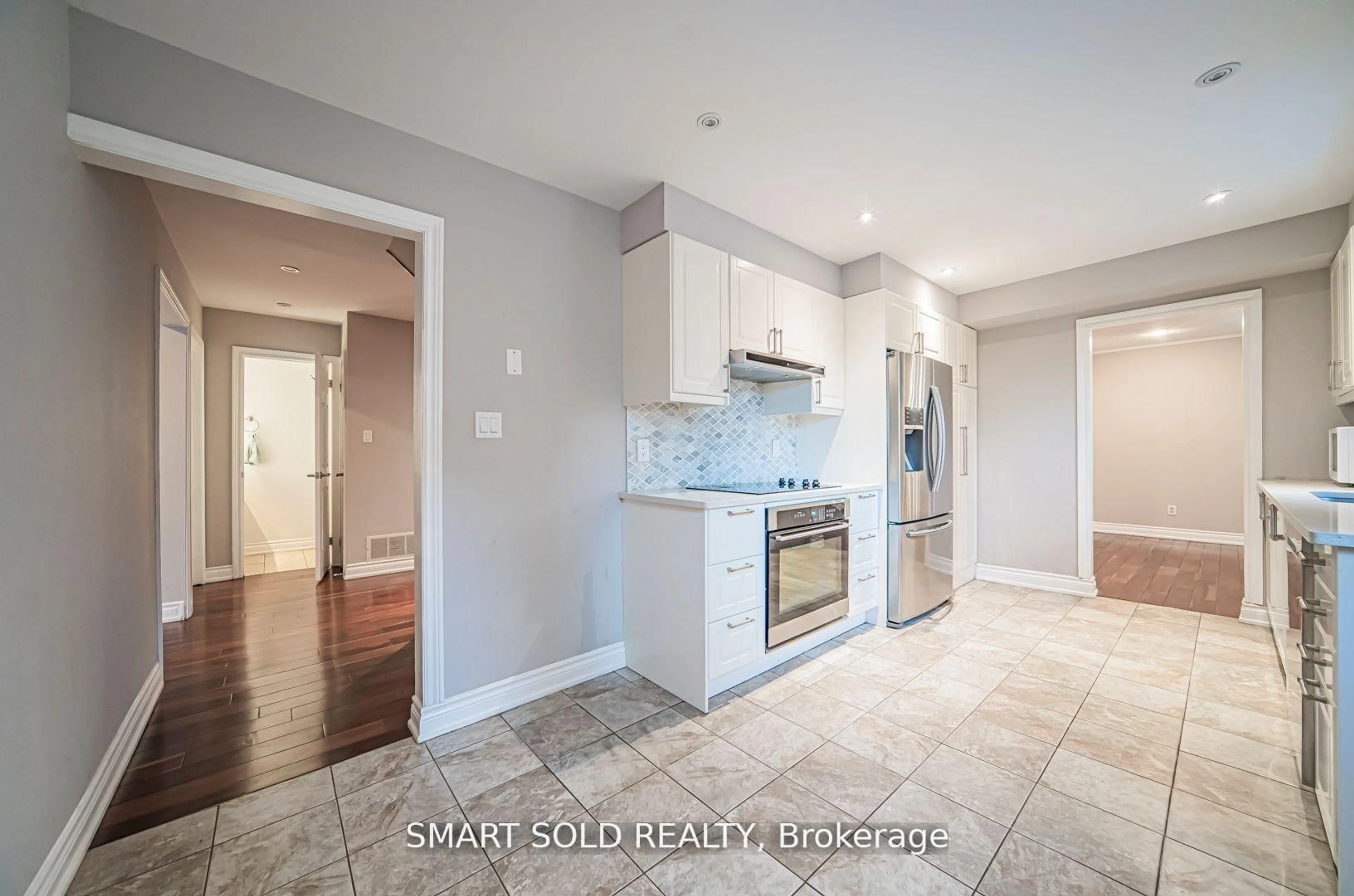 Open concept kitchen, ceramic/tile floor for 120 Abbeywood Tr, Toronto Ontario M3B 3B5