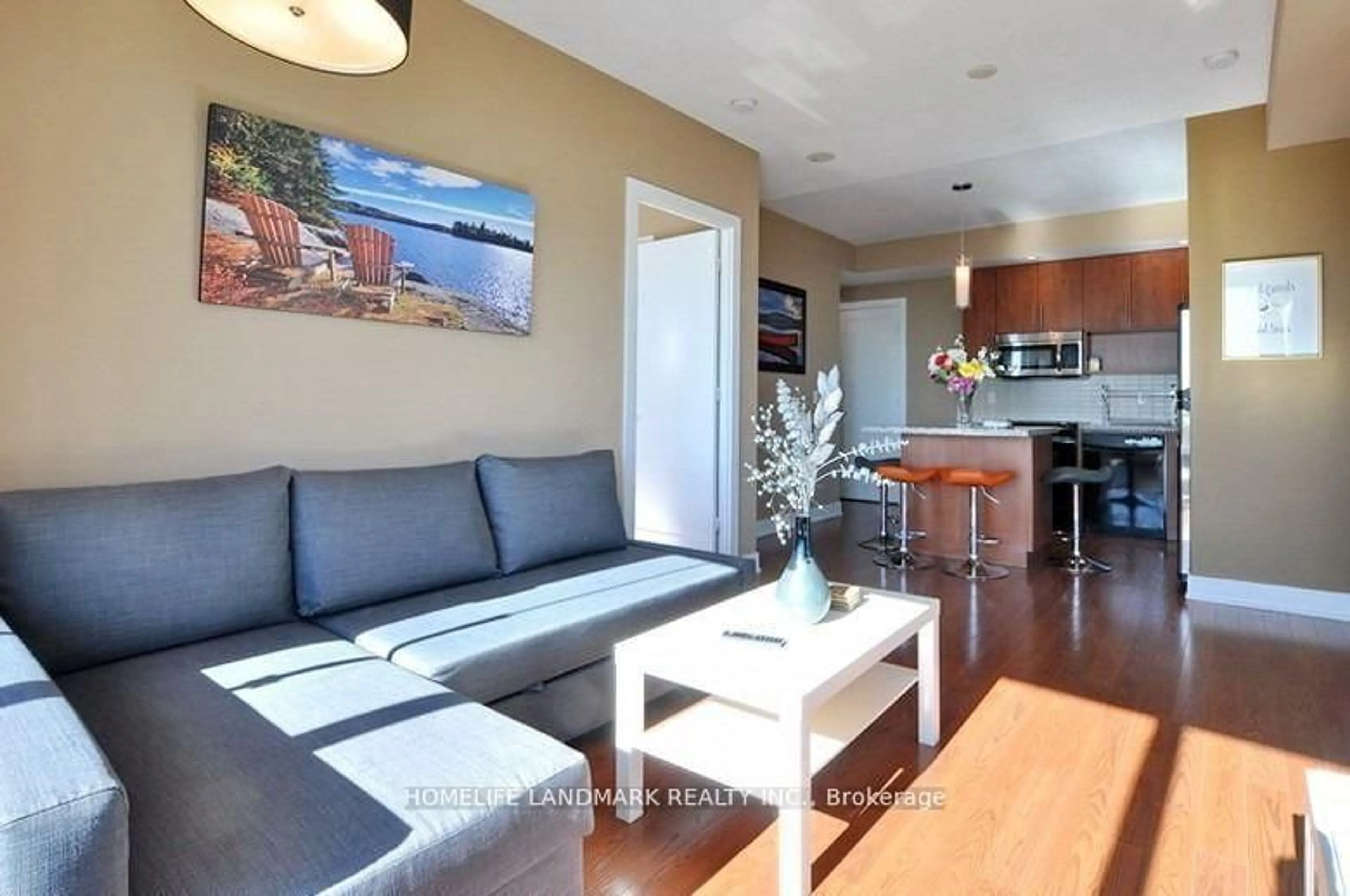 Living room with furniture, wood/laminate floor for 120 Homewood Ave #1807, Toronto Ontario M4Y 2J3