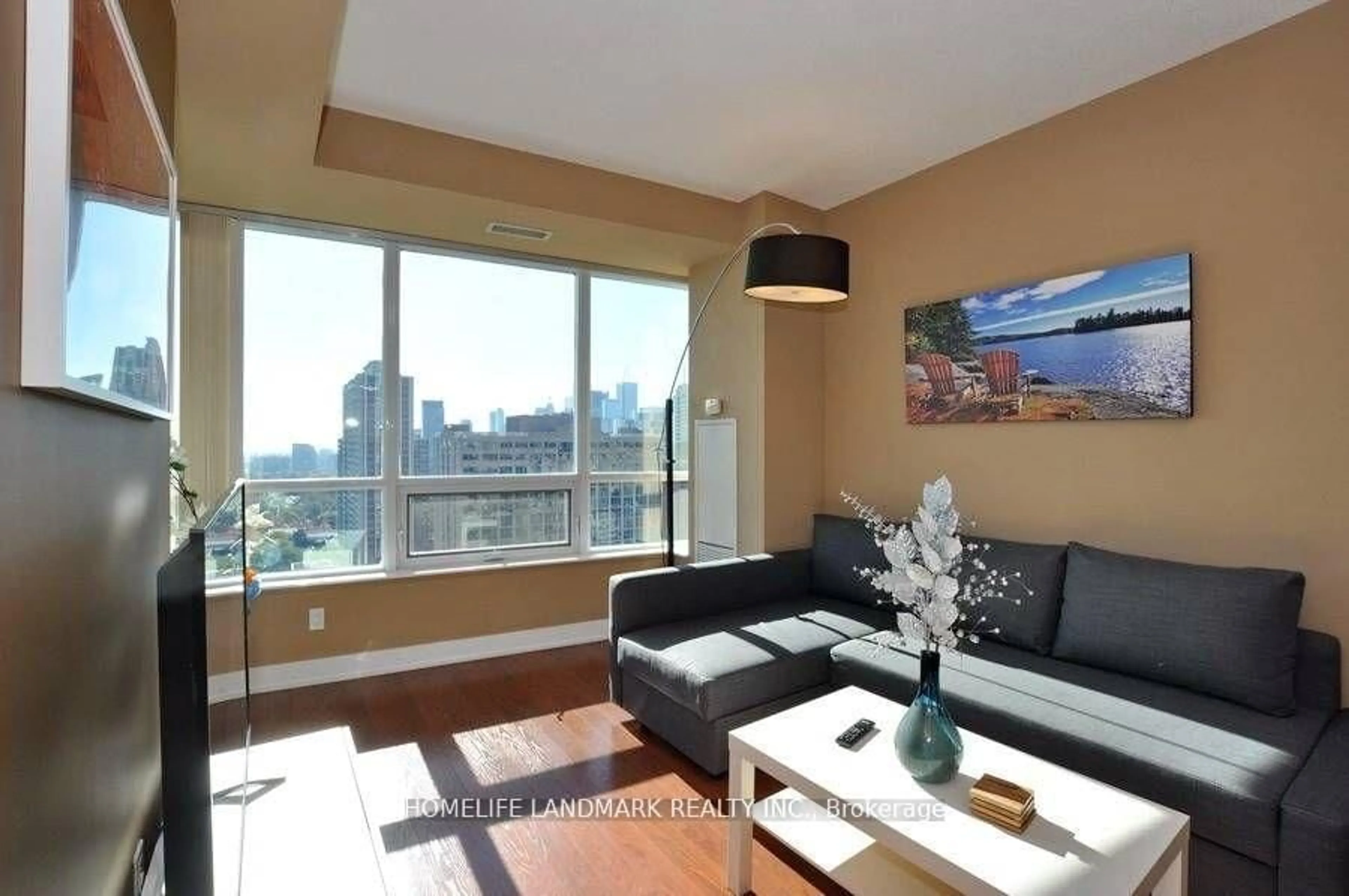 Living room with furniture, wood/laminate floor for 120 Homewood Ave #1807, Toronto Ontario M4Y 2J3