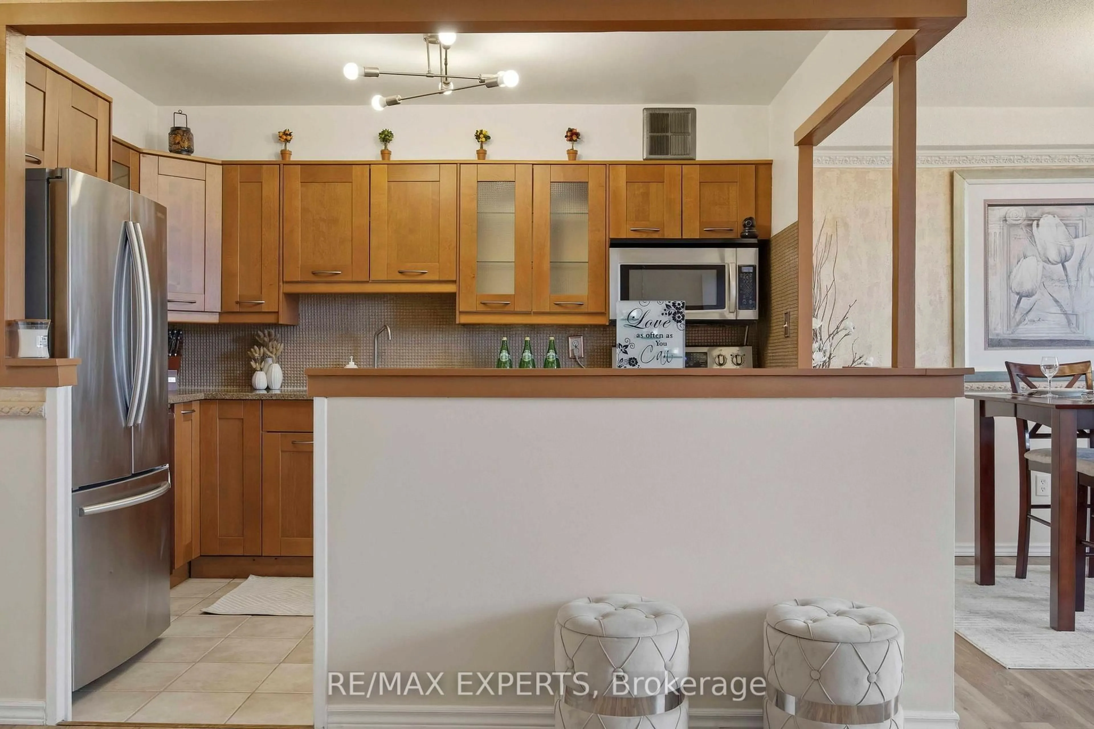 Open concept kitchen, ceramic/tile floor for 5 Shady Gfwy #1417, Toronto Ontario M3C 3A5