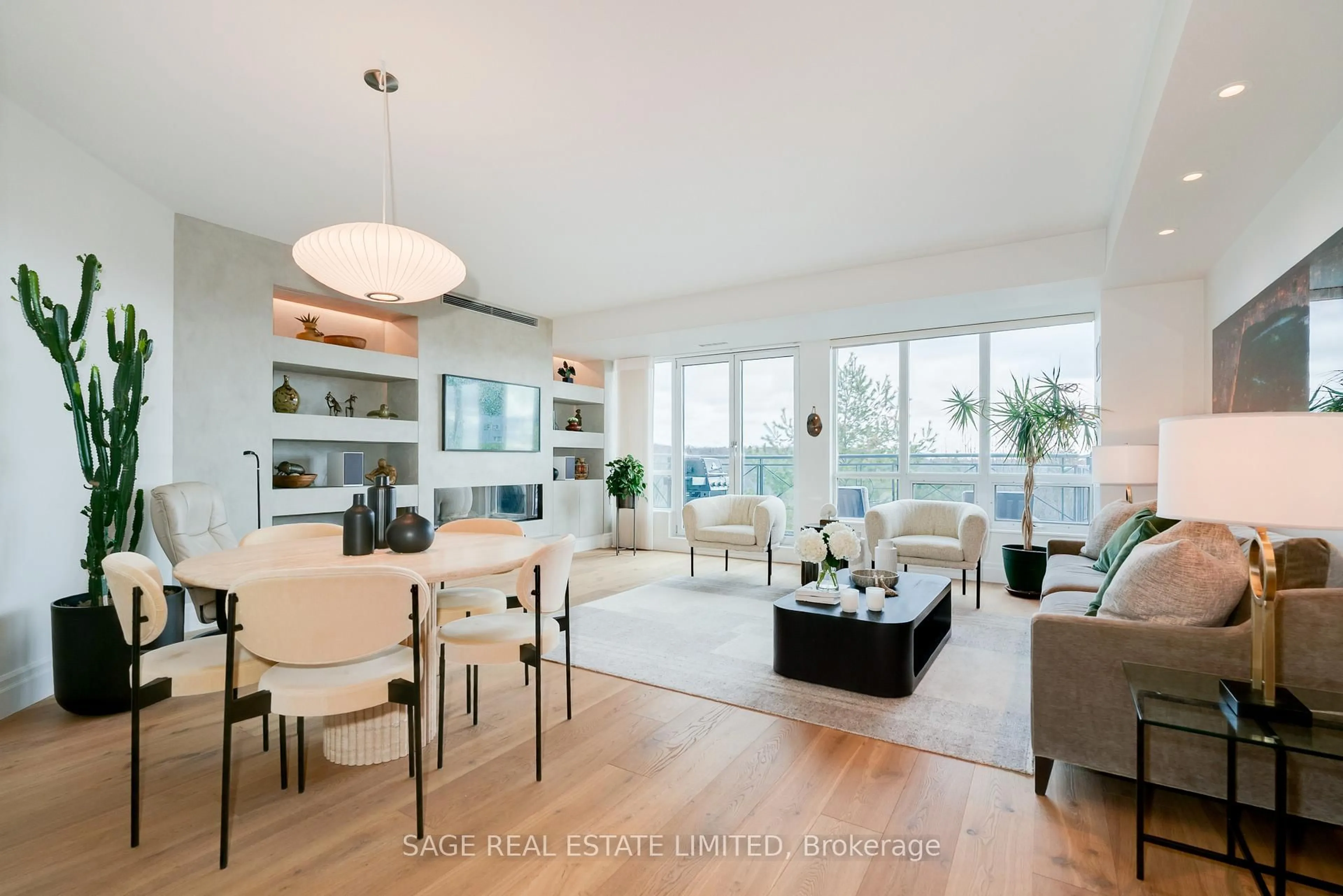 Living room with furniture, wood/laminate floor for 20 Scrivener Sq #615, Toronto Ontario M4W 3X9