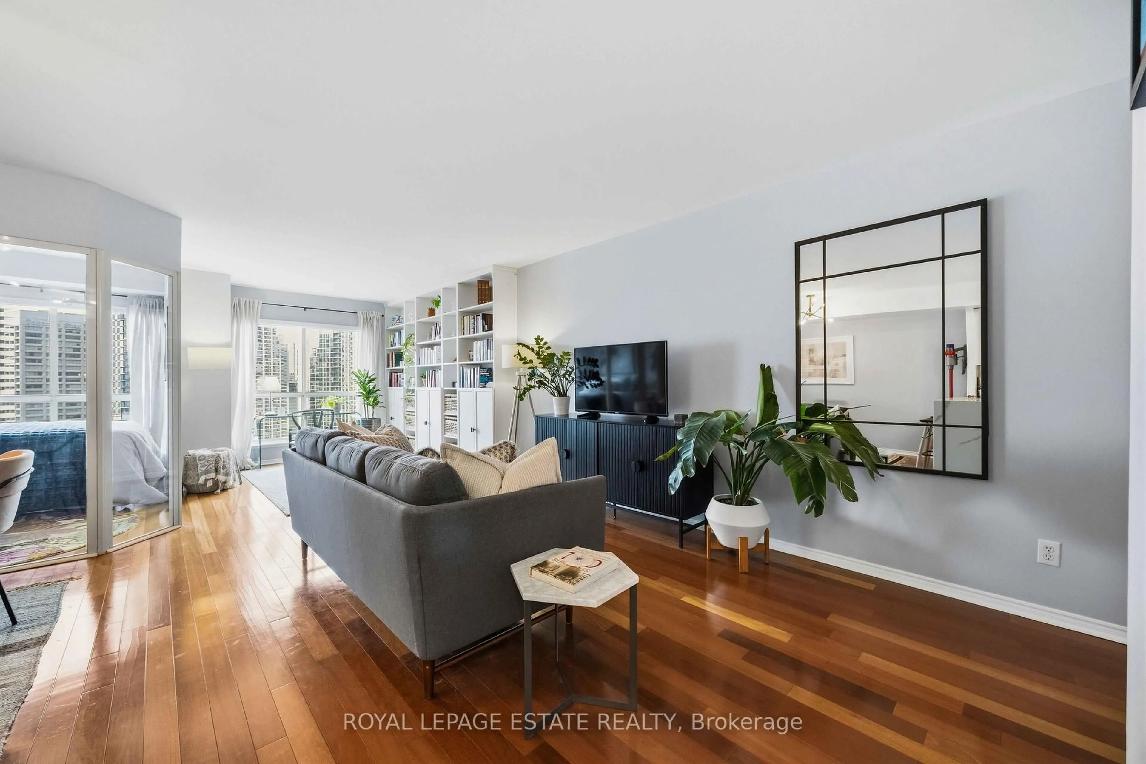 Living room with furniture, wood/laminate floor for 25 The Esplanade #2118, Toronto Ontario M5E 1W5