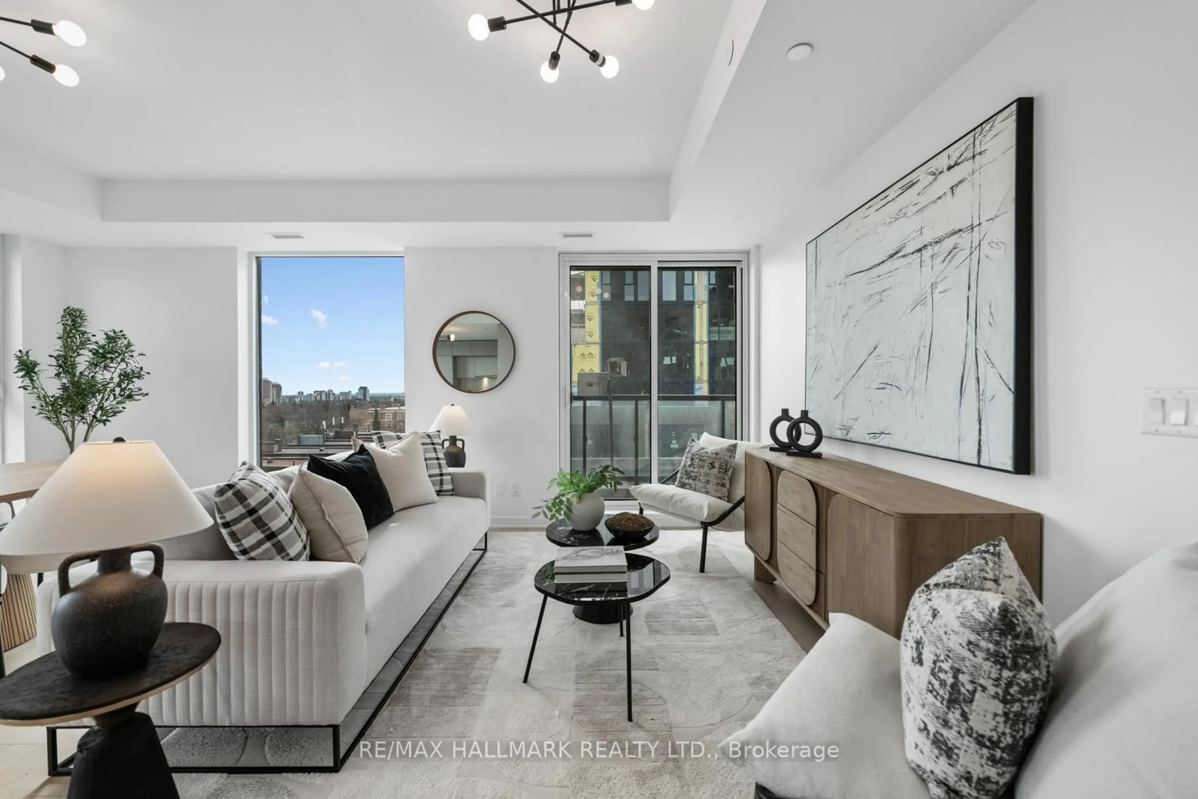 Living room with furniture, unknown for 185 Alberta Ave #907, Toronto Ontario M6C 0A5