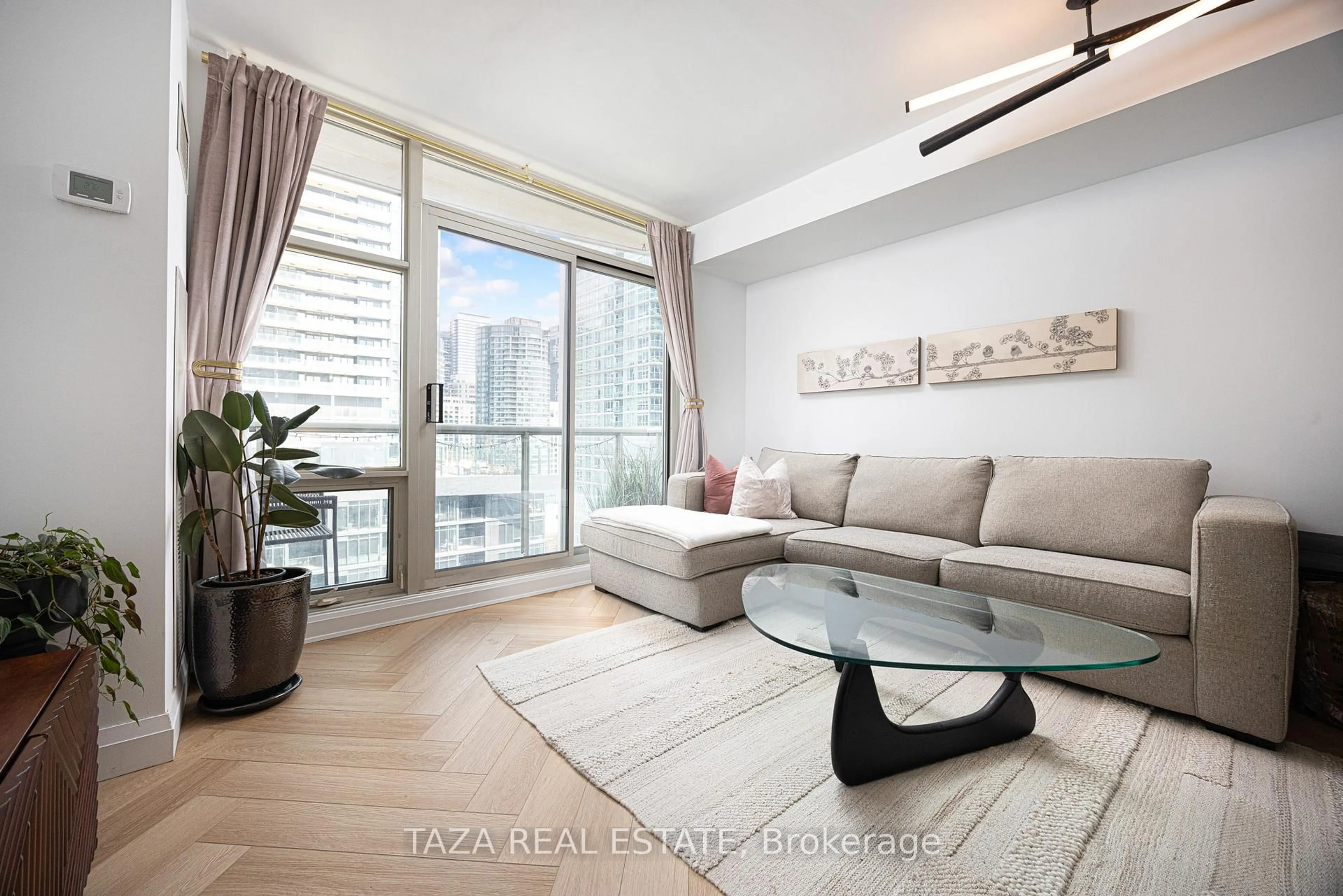 Living room with furniture, unknown for 10 Navy Wharf Crt #1705, Toronto Ontario M5V 3V2