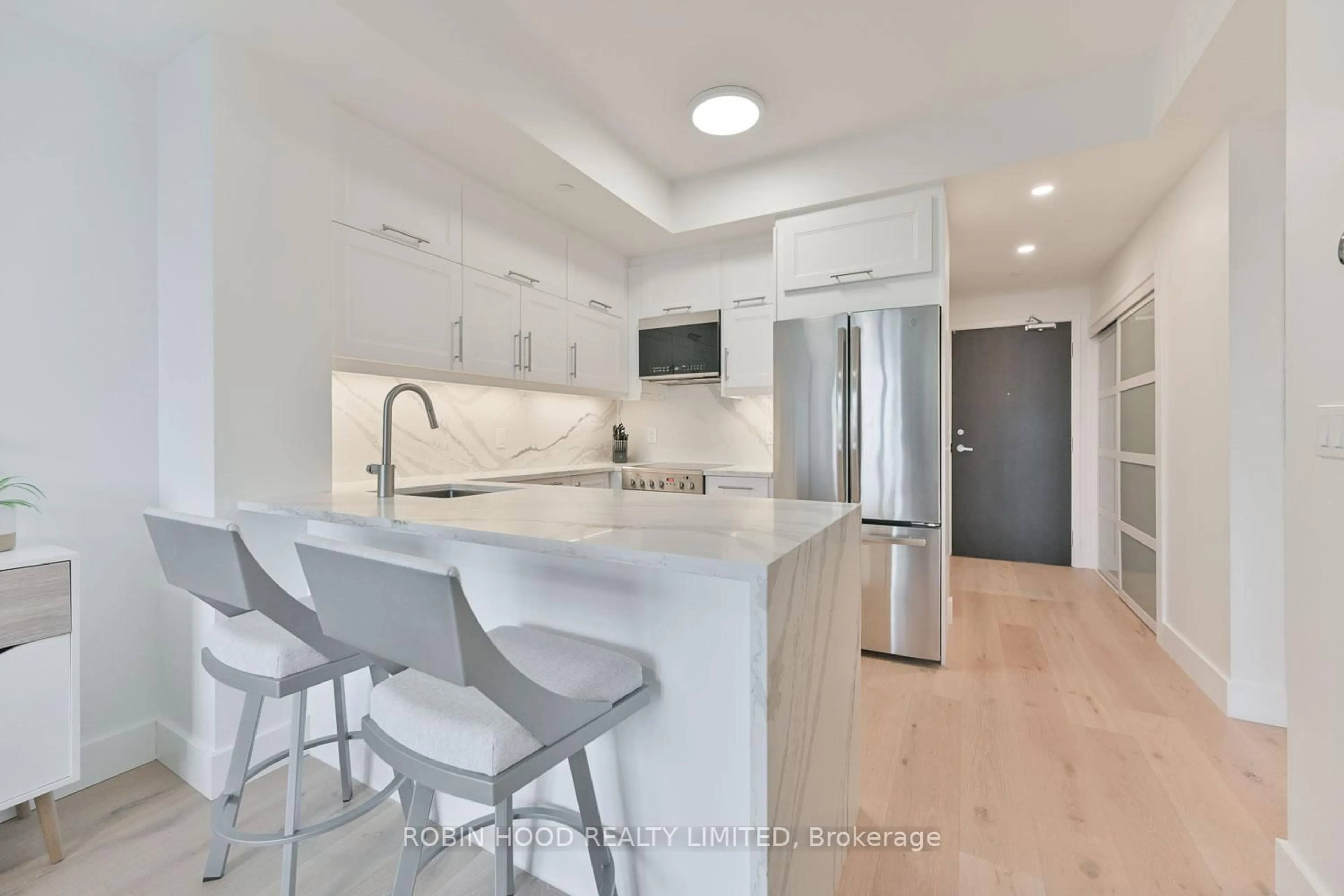 Open concept kitchen, ceramic/tile floor for 170 Sumach St #2303, Toronto Ontario M5A 0C3