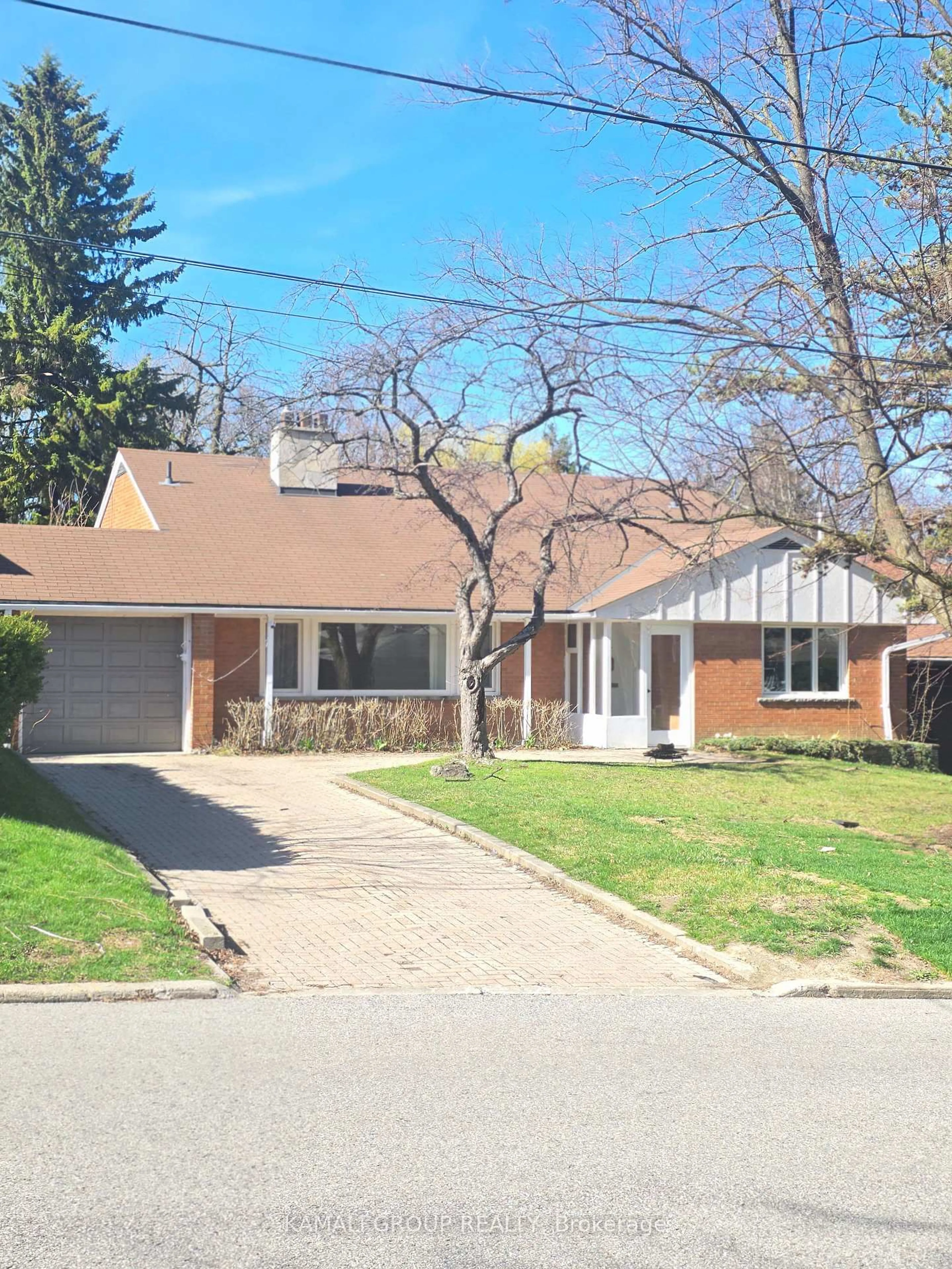 Home with brick exterior material, street for 66 Hawksbury Dr, Toronto Ontario M2K 1M5