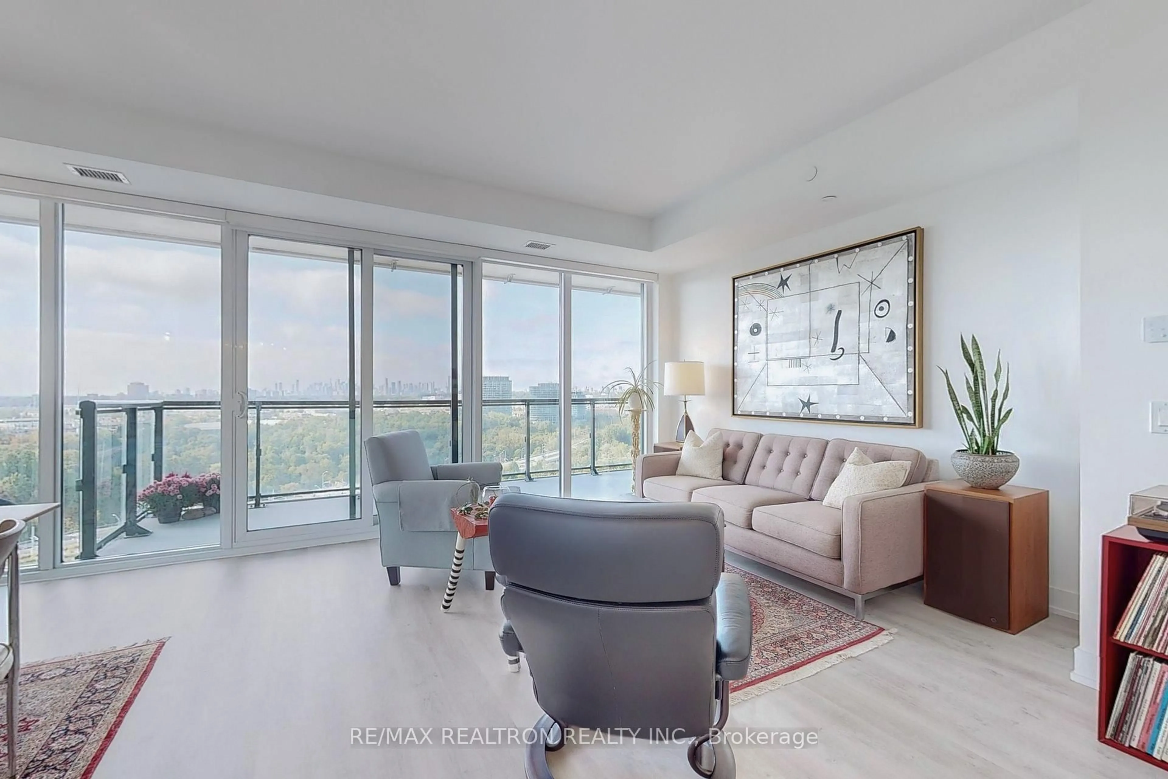 Living room with furniture, unknown for 20 Inn On The Park Dr #1432, Toronto Ontario M3C 0P8