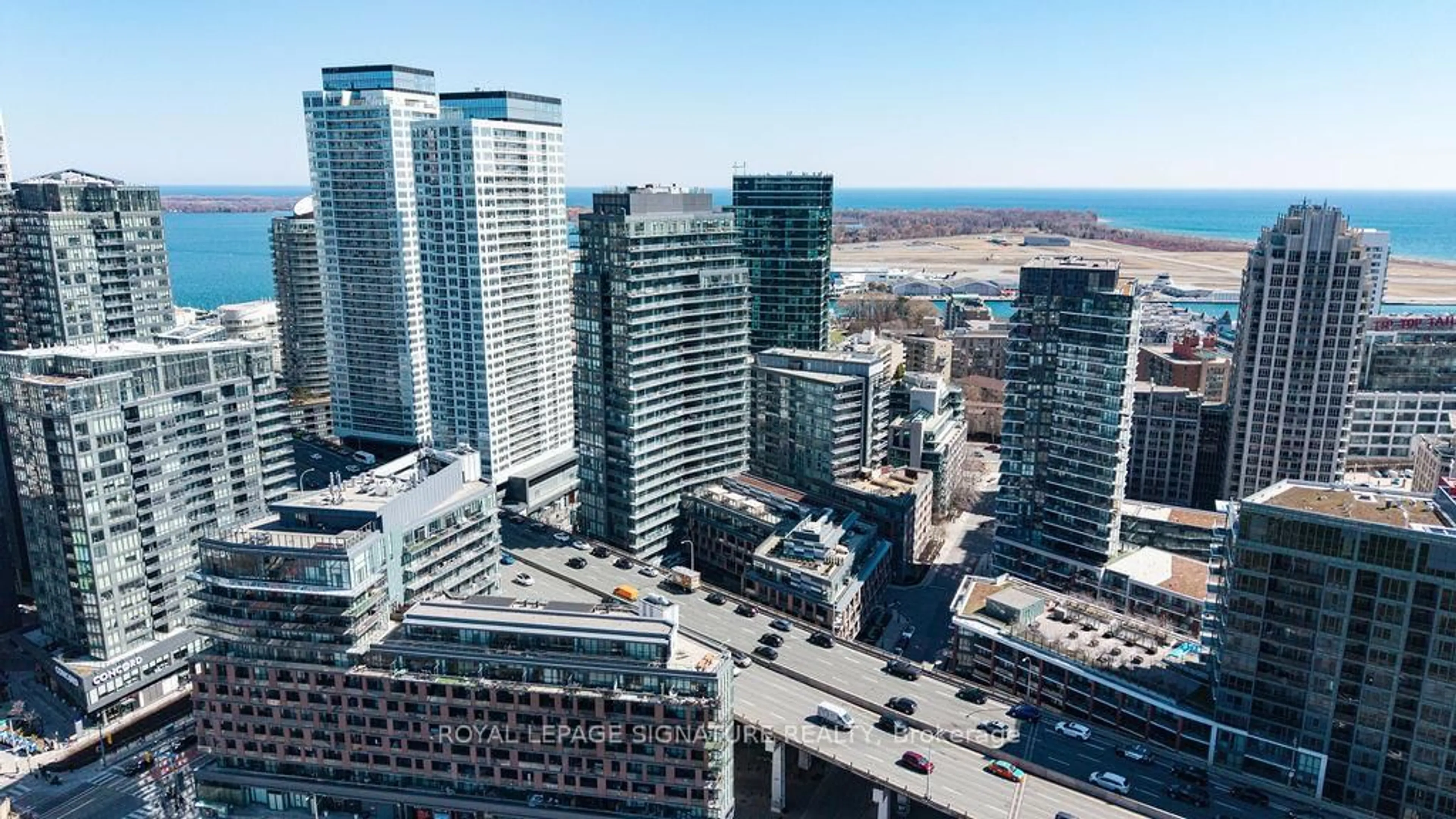 A pic from outside/outdoor area/front of a property/back of a property/a pic from drone, city buildings view from balcony for 20 Bruyeres Mews #501, Toronto Ontario M5V 0G8