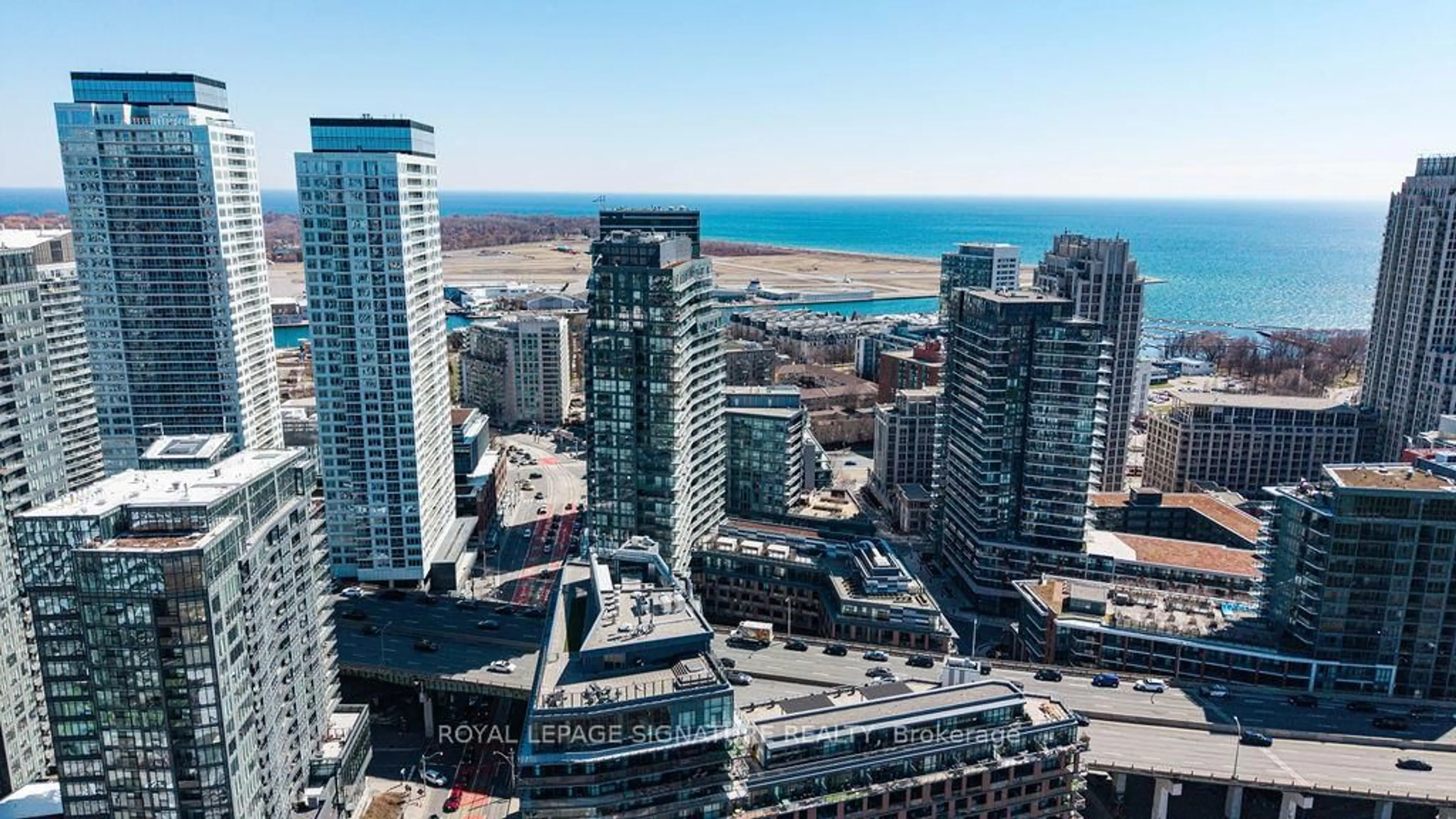 A pic from outside/outdoor area/front of a property/back of a property/a pic from drone, city buildings view from balcony for 20 Bruyeres Mews #501, Toronto Ontario M5V 0G8