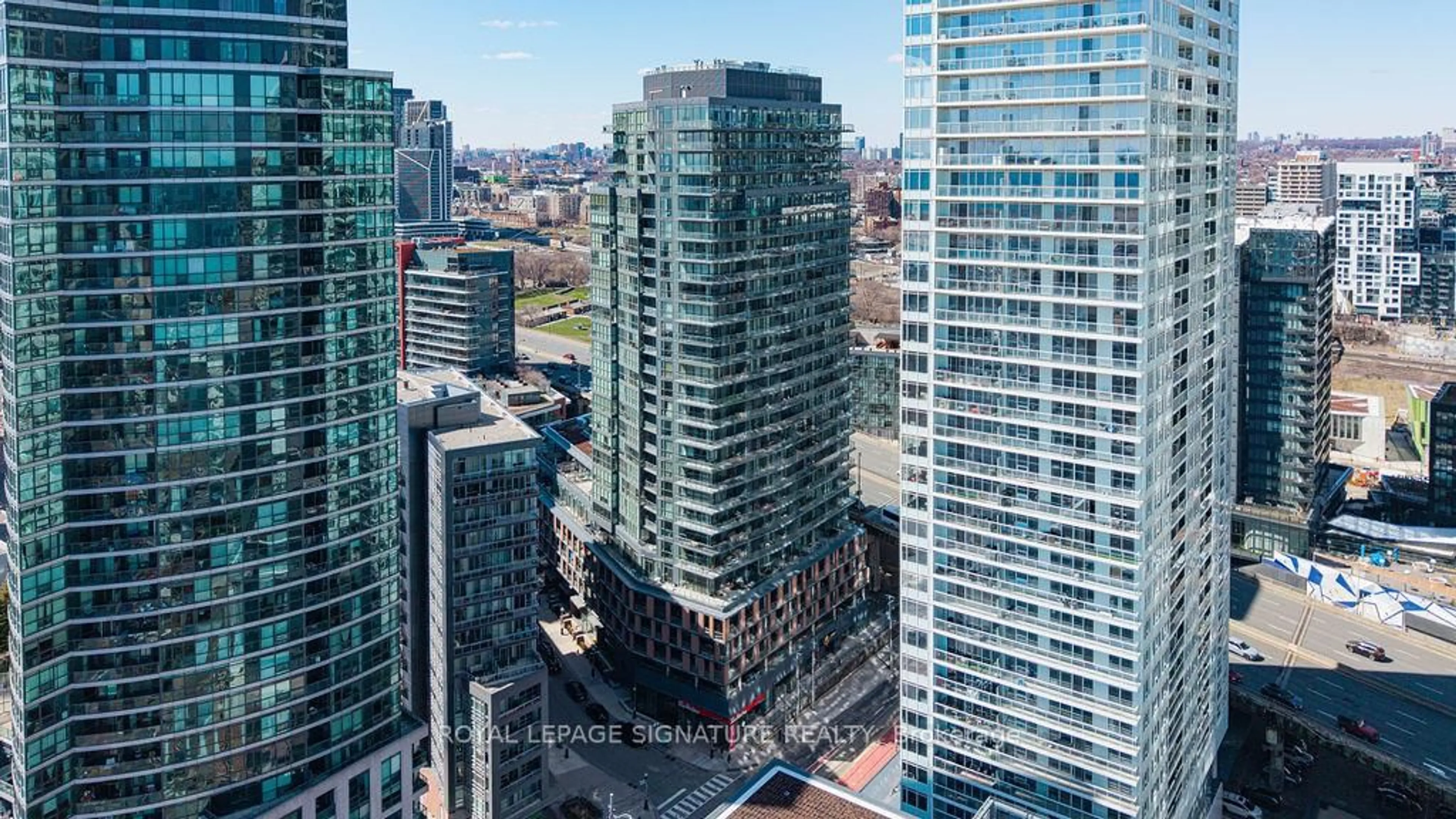 A pic from outside/outdoor area/front of a property/back of a property/a pic from drone, city buildings view from balcony for 20 Bruyeres Mews #501, Toronto Ontario M5V 0G8