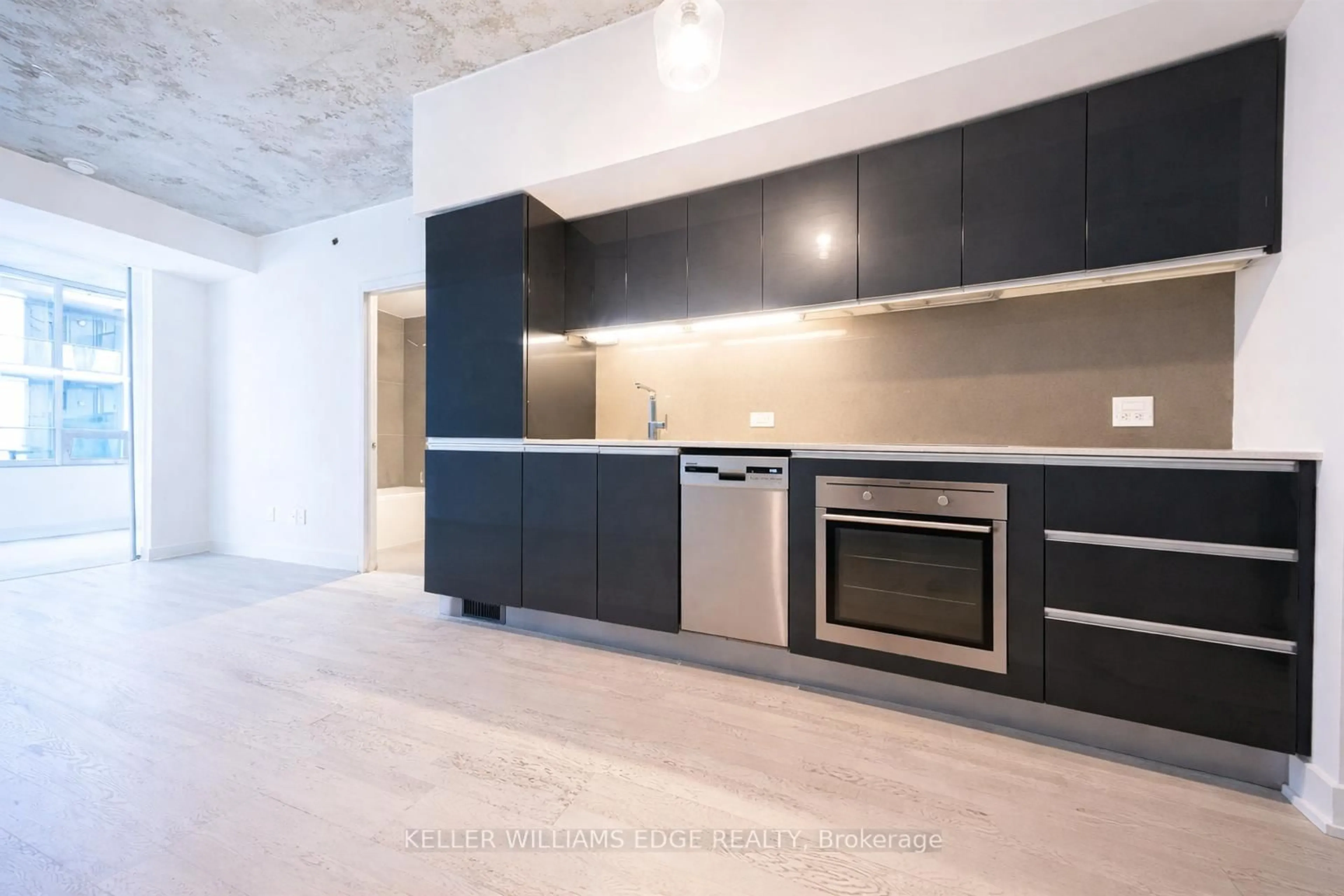Open concept kitchen, unknown for 20 Gladstone Ave #302, Toronto Ontario M6J 3K6