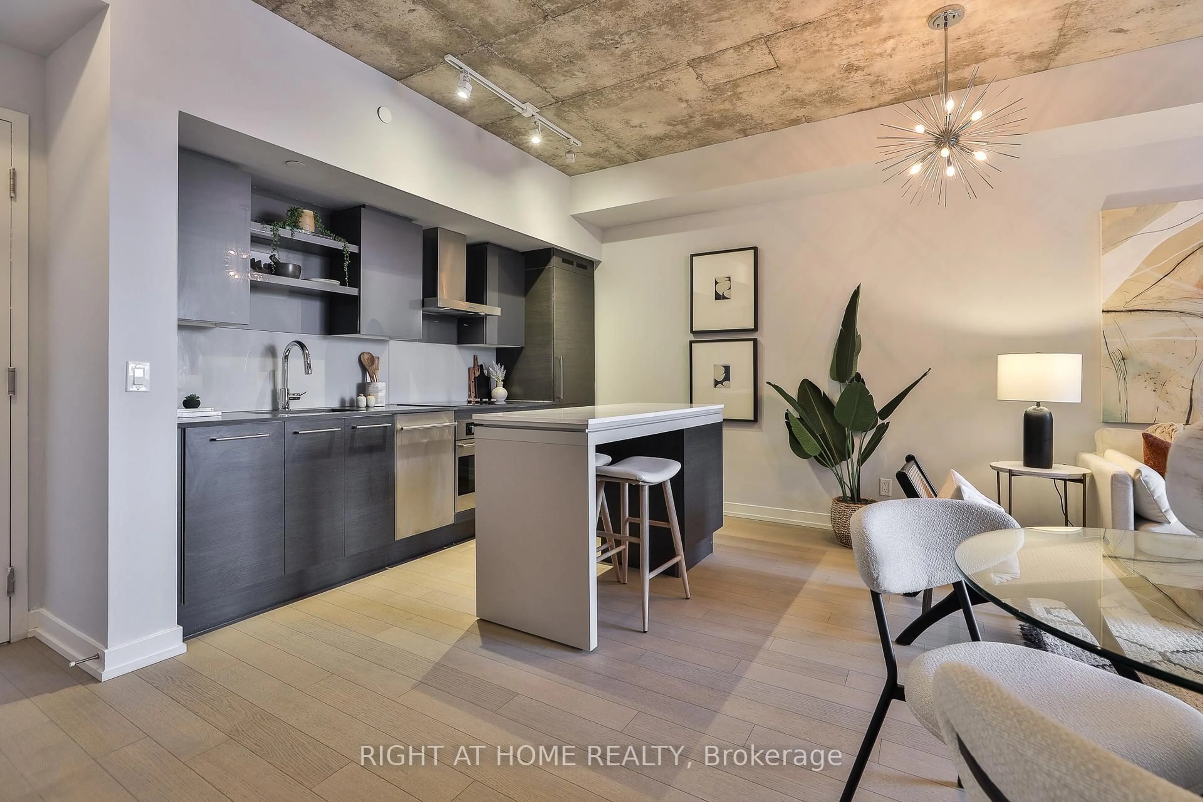 Contemporary kitchen, cement floor for 1030 King St #909, Toronto Ontario M6K 3N3
