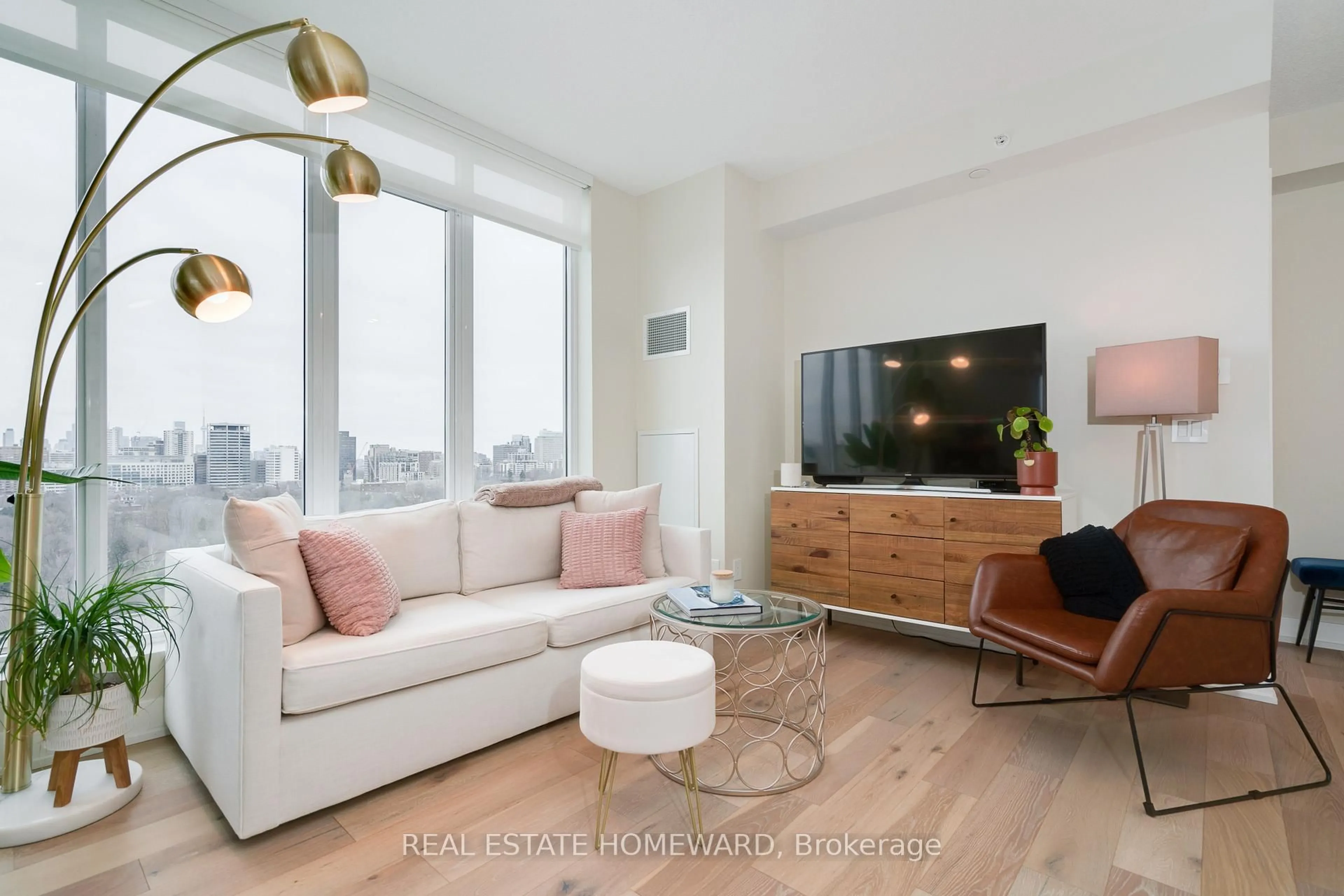 Living room with furniture, wood/laminate floor for 68 Merton St #LPH03, Toronto Ontario M4S 1A1