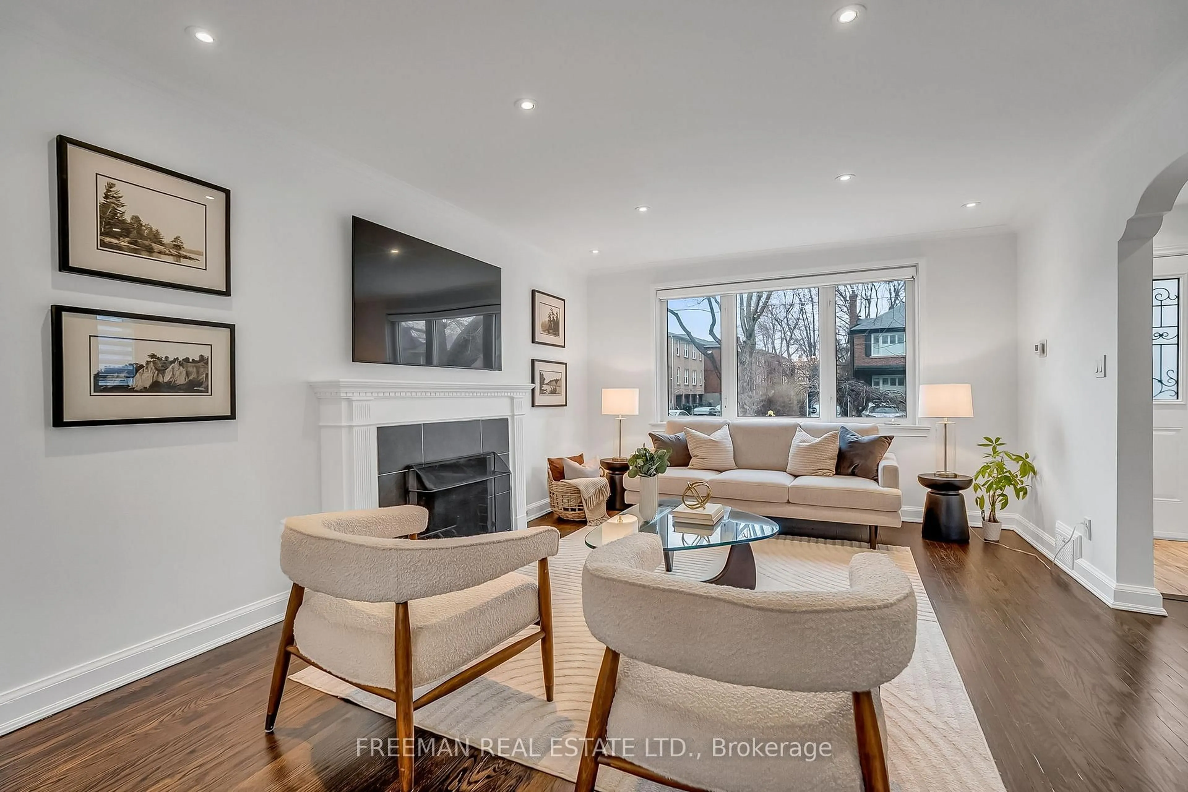 Living room with furniture, wood/laminate floor for 49 Romney Rd, Toronto Ontario M3H 1H4