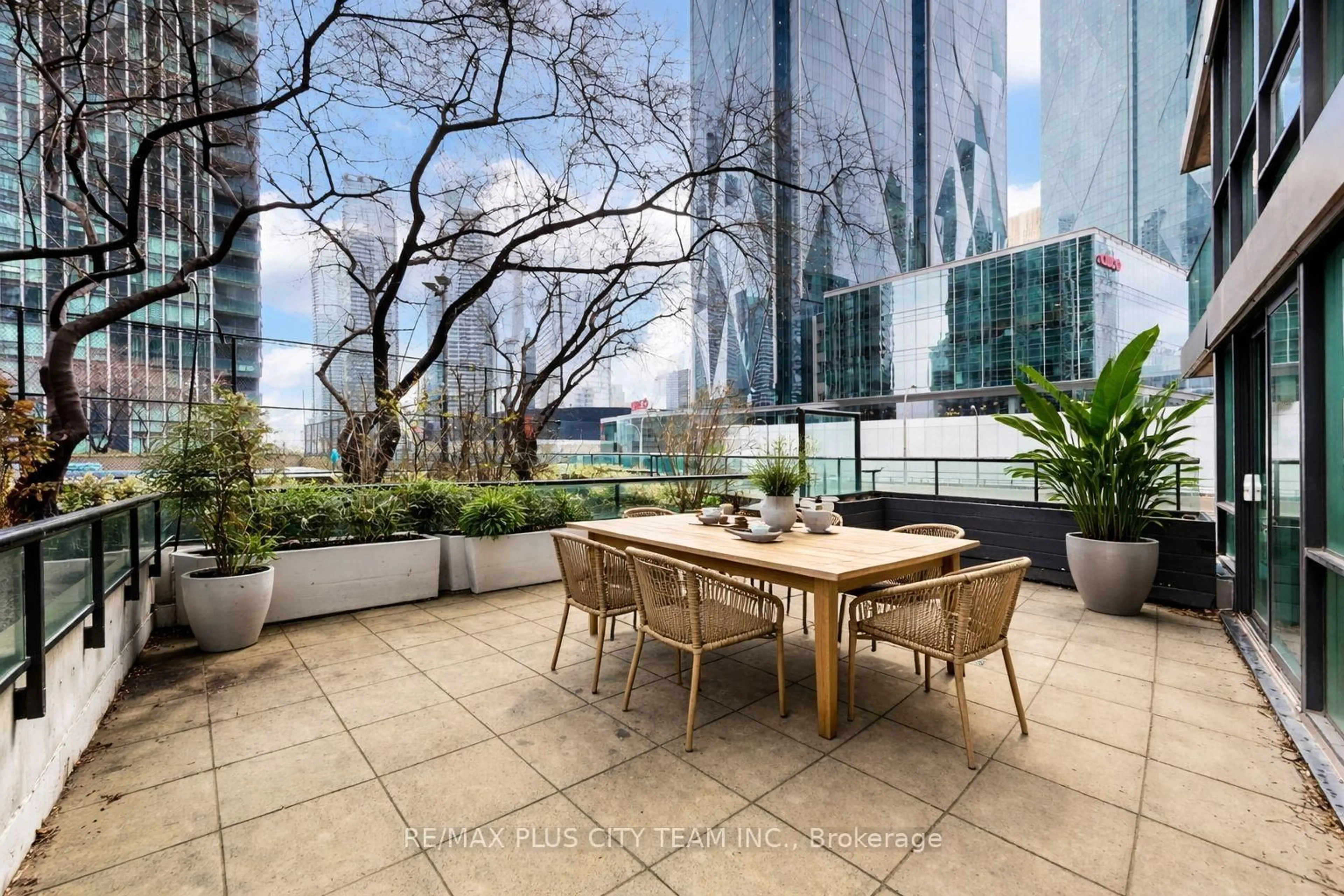 Patio, city buildings view from balcony for 16 Yonge St #502, Toronto Ontario M5E 2A1