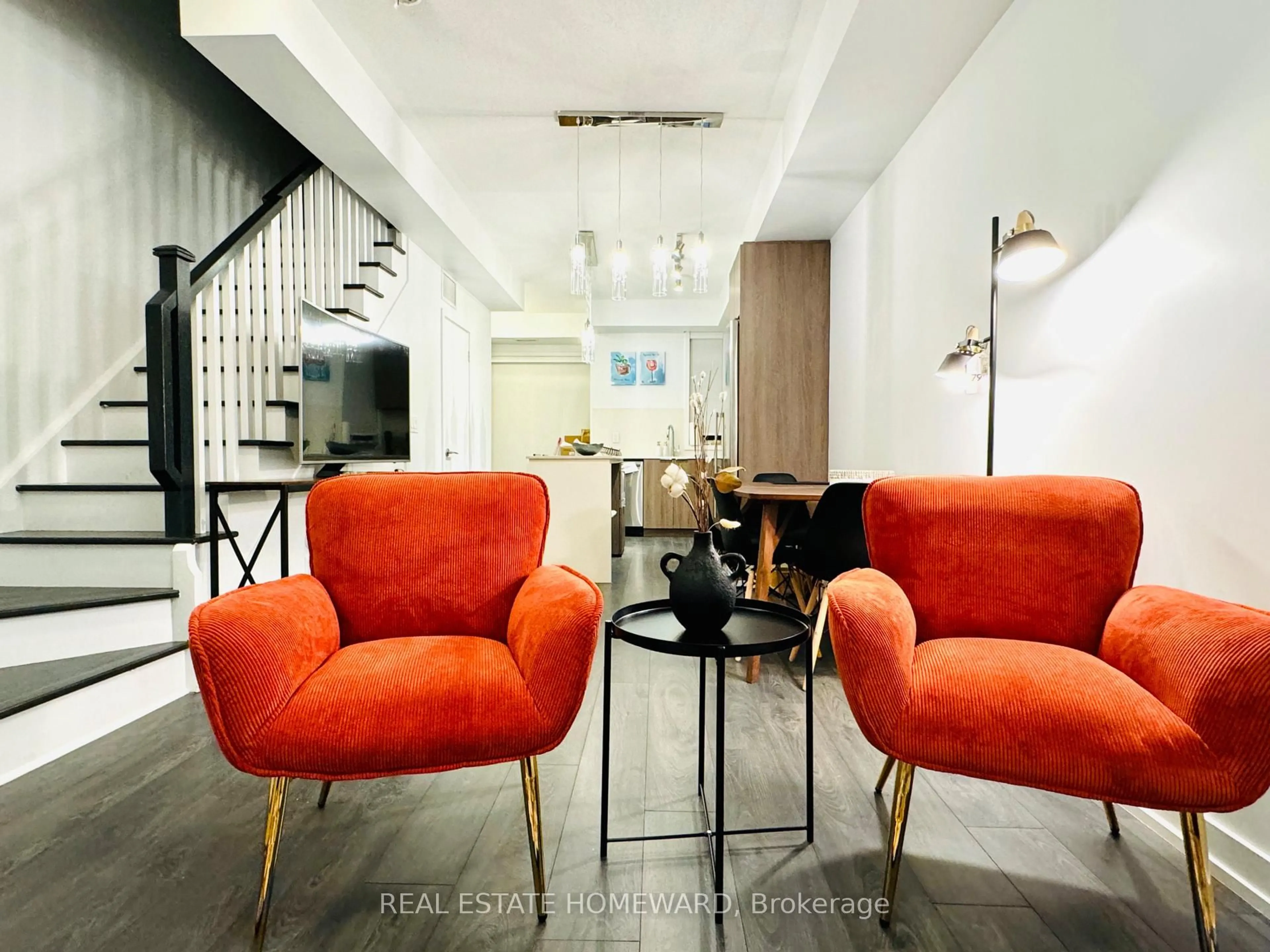 Living room with furniture, cement floor for 17 St. Bartholomew St, Toronto Ontario M5A 0A3