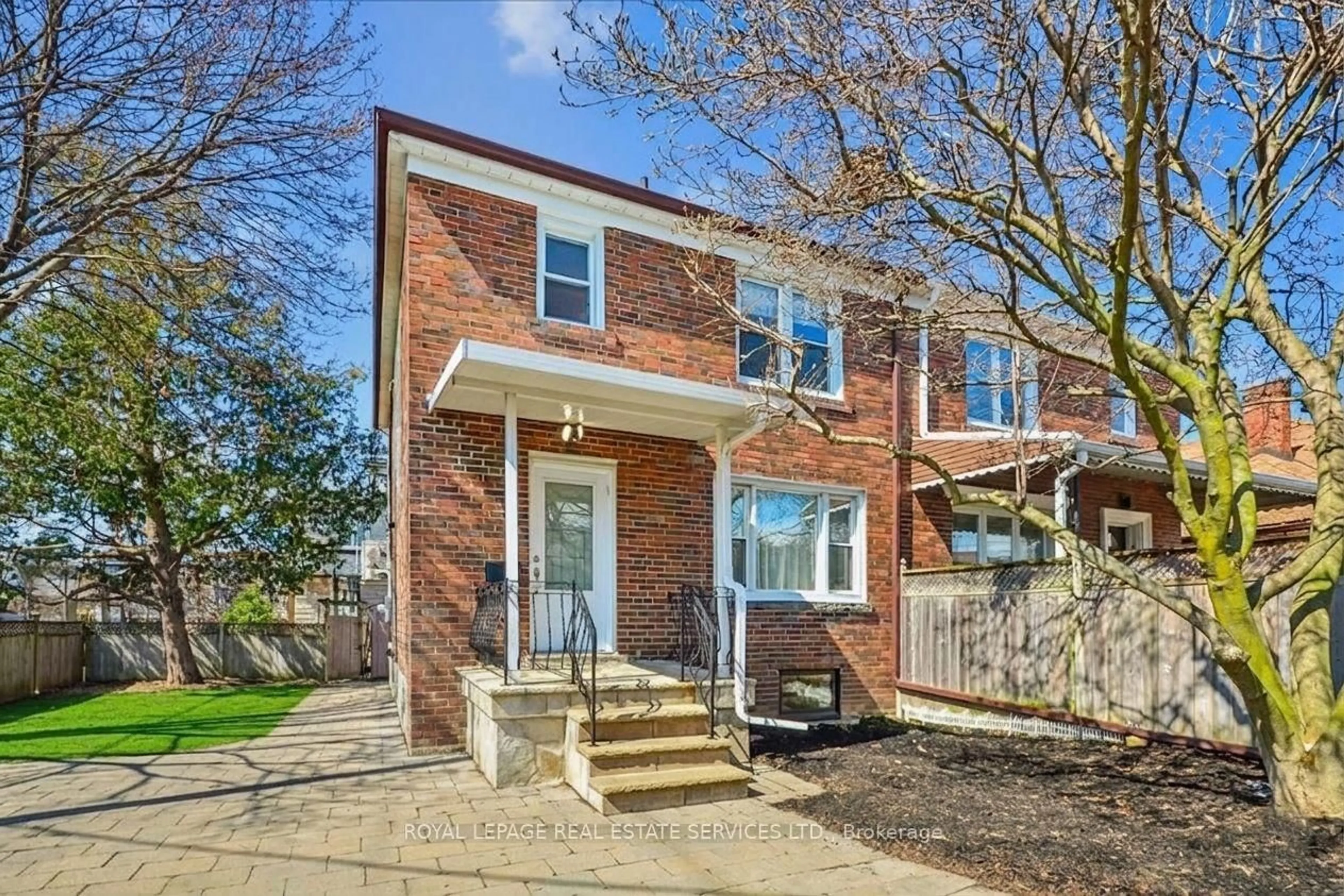 Home with brick exterior material, street for 352 Winnett Ave, Toronto Ontario M6C 3M1