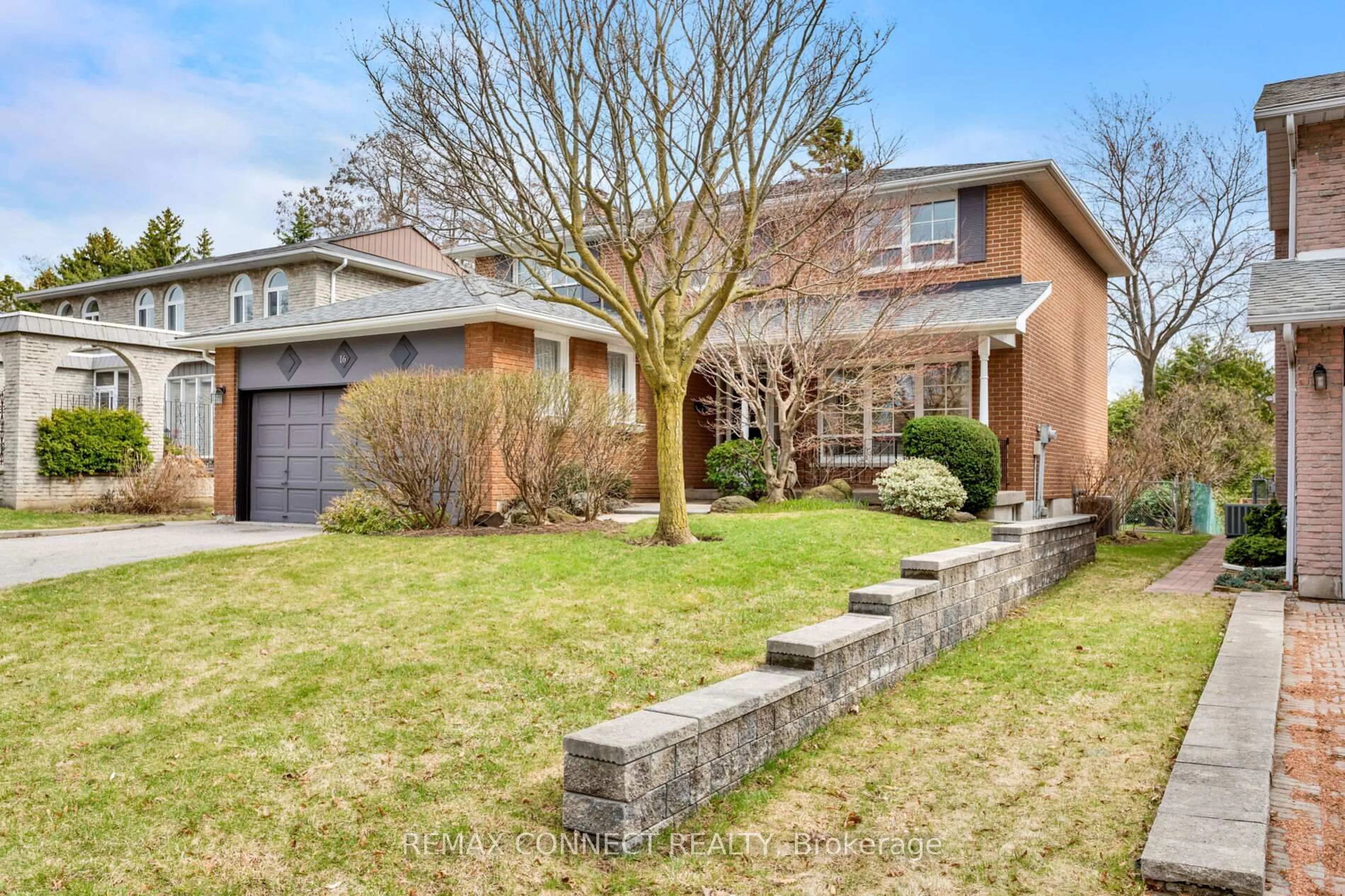 Home with brick exterior material, street for 16 Shadberry Dr, Toronto Ontario M2H 3C8