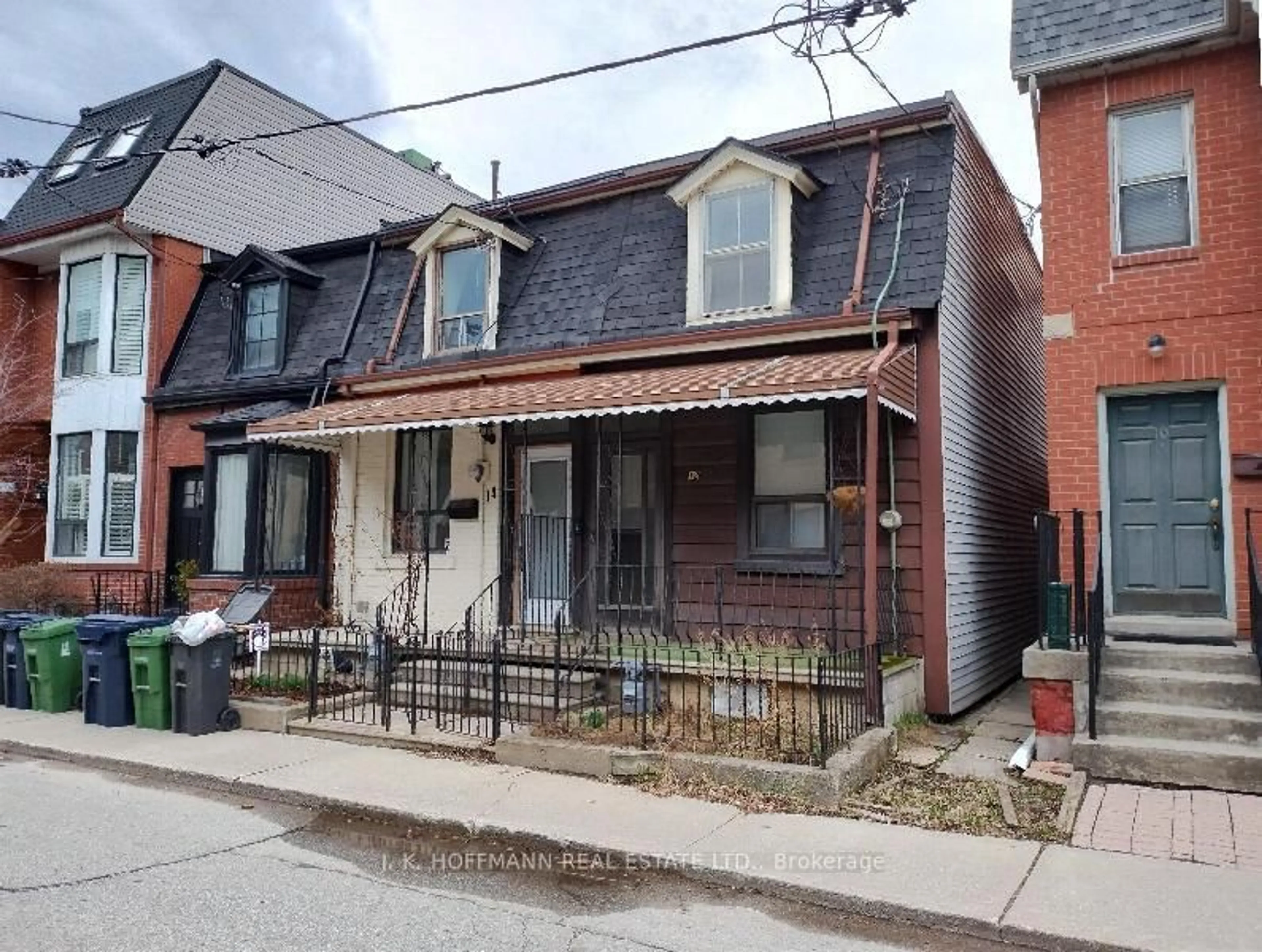 Home with brick exterior material, street for 12 Whitaker Ave, Toronto Ontario M6J 1A1