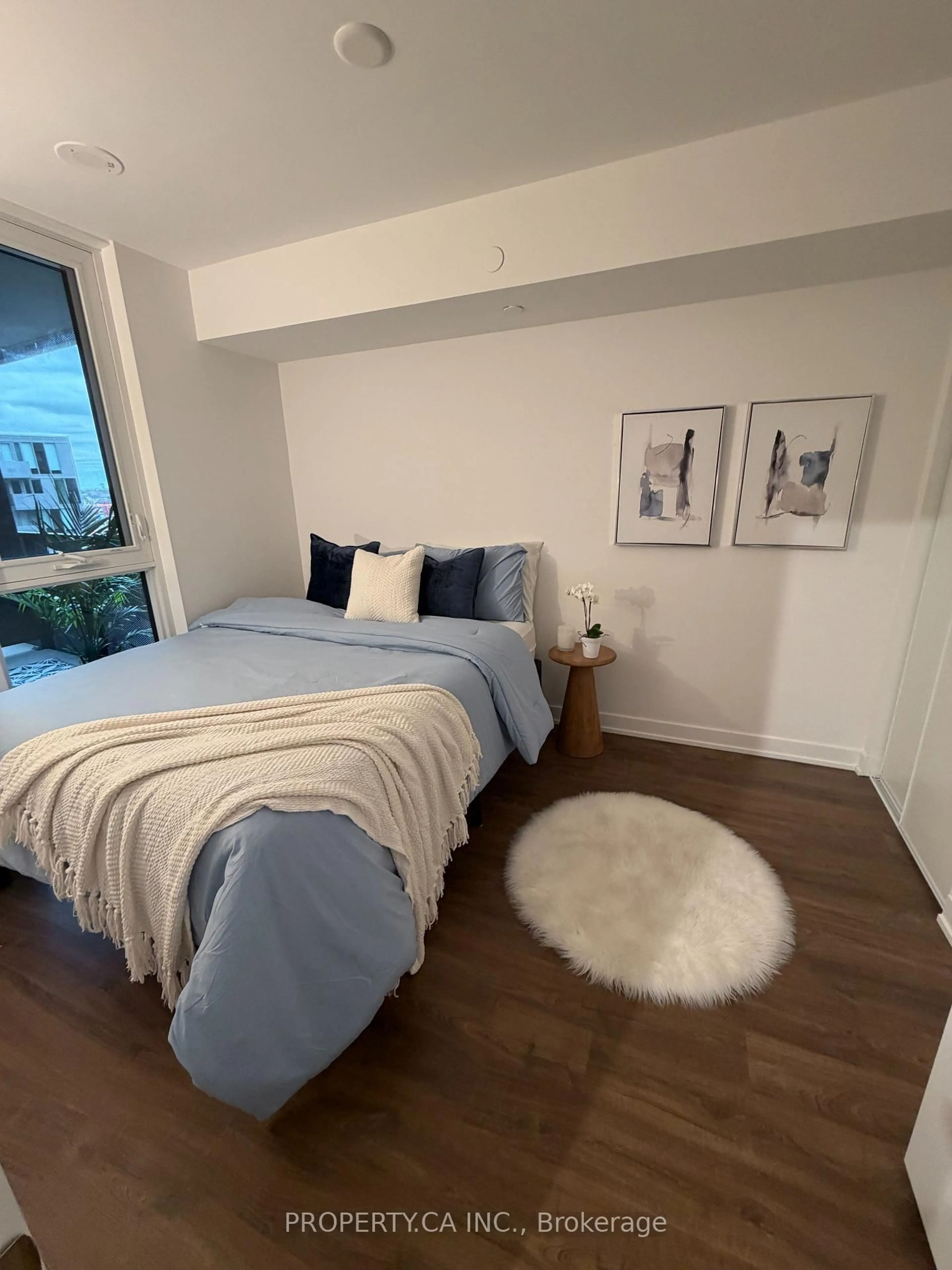 Bedroom with bed, unknown for 30 Tretti Way #525, Toronto Ontario M3H 0E3