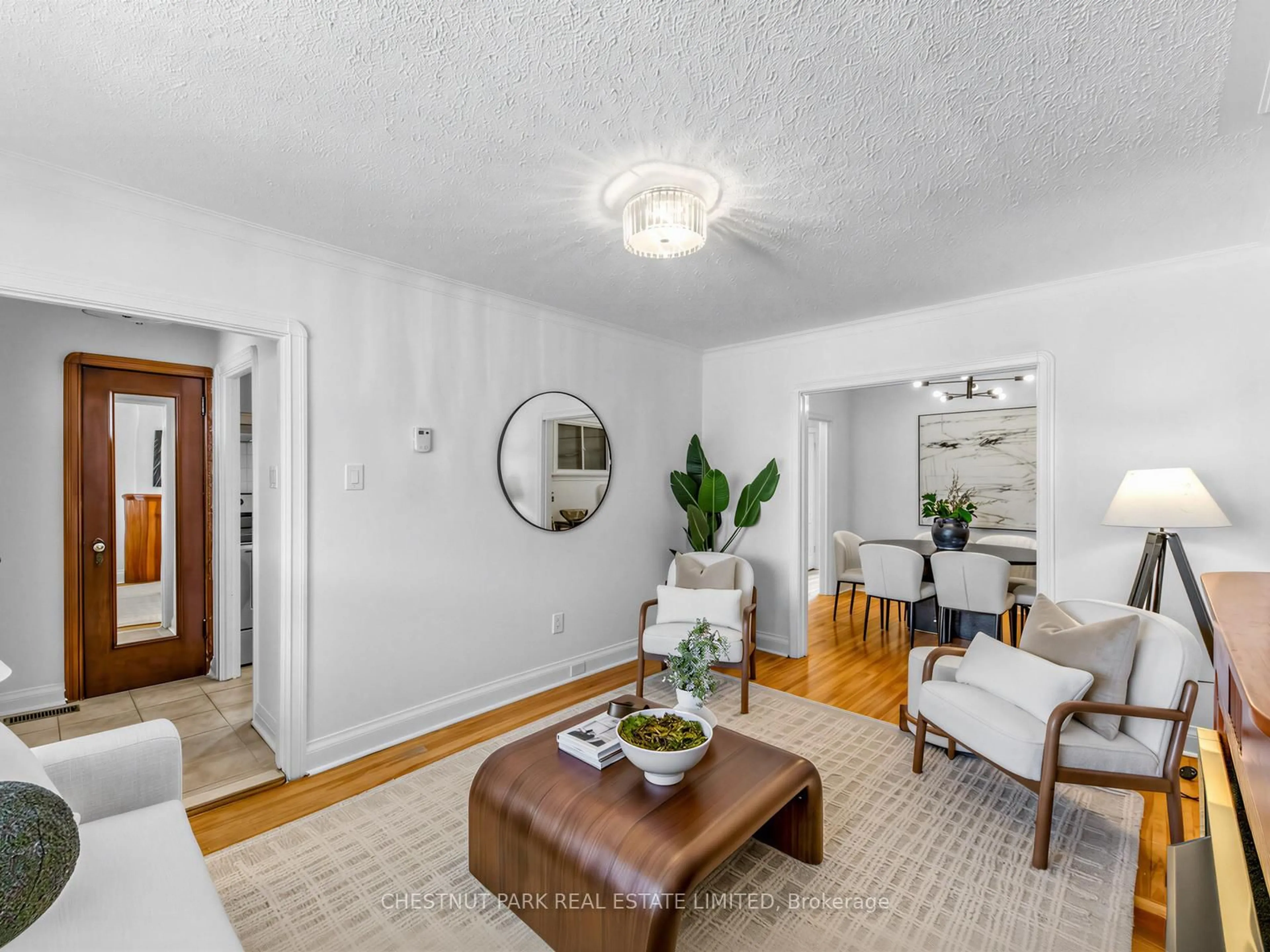 Living room with furniture, unknown for 27 Amherst Ave, Toronto Ontario M6E 1Z2