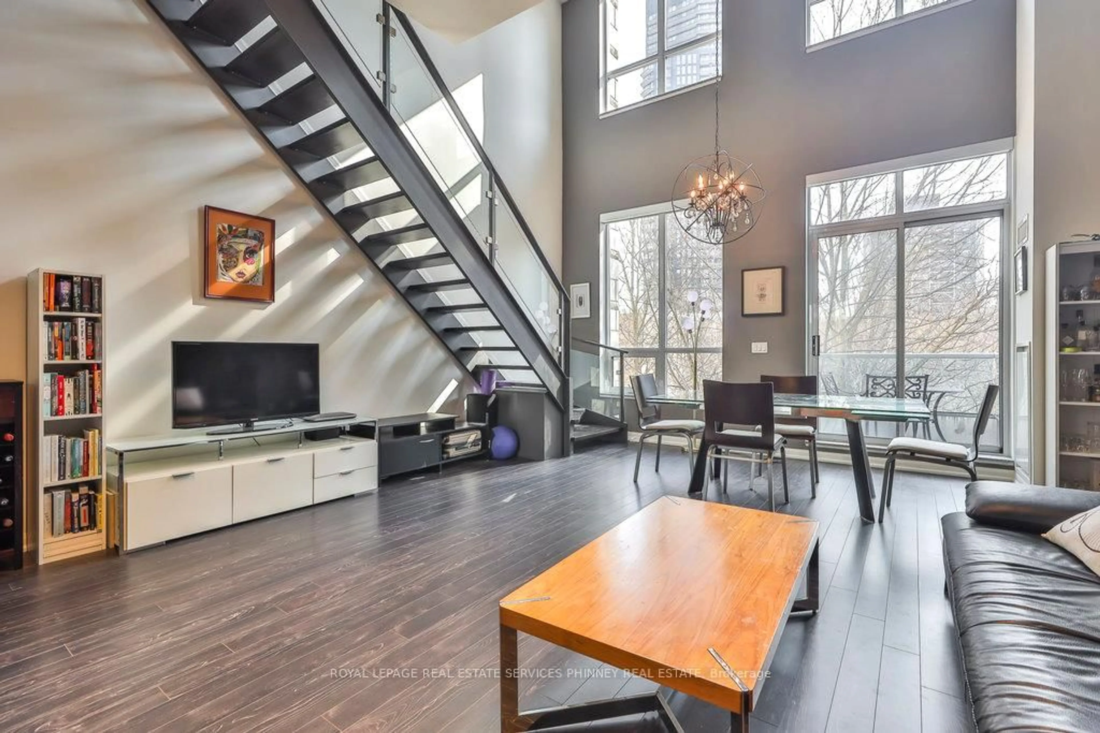 Living room with furniture, wood/laminate floor for 500 Sherbourne St #215, Toronto Ontario M4X 1L1