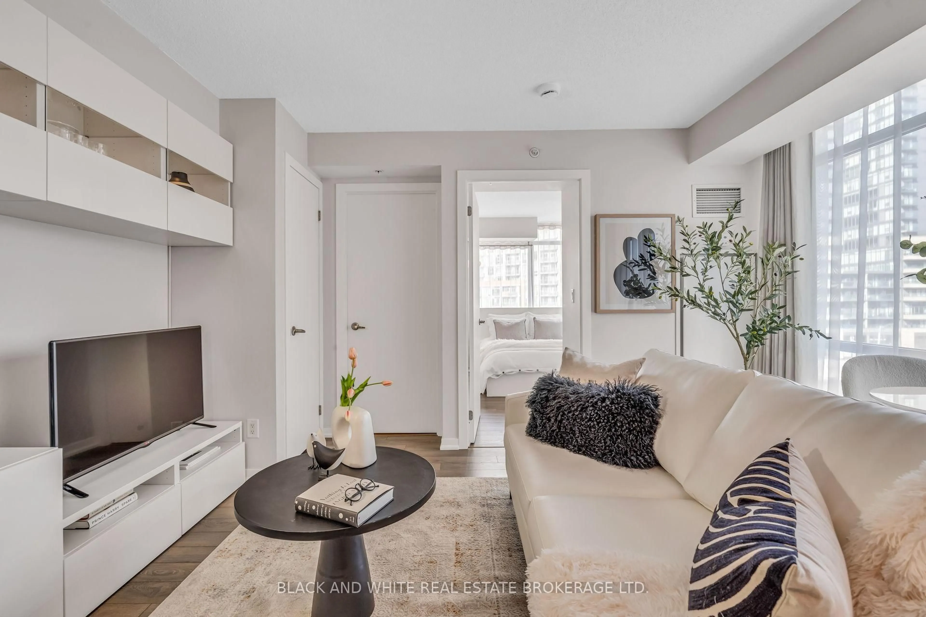 Living room with furniture, unknown for 20 Joe Shuster Way #403, Toronto Ontario M6K 0A3