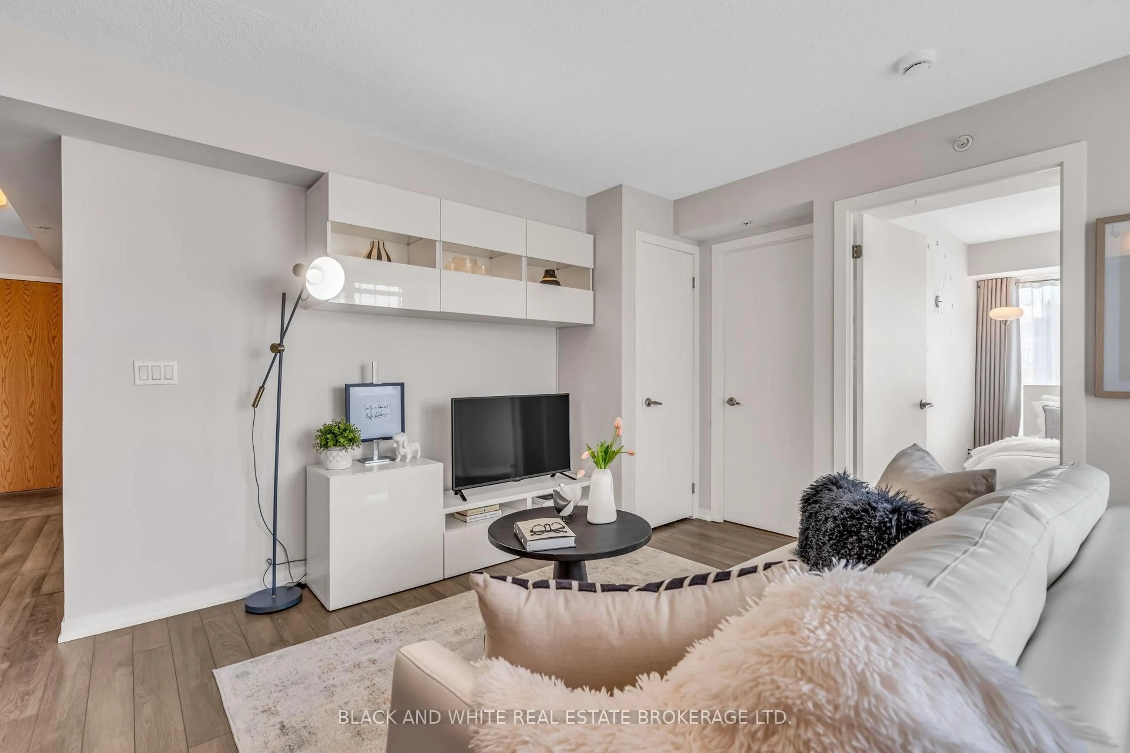 Living room with furniture, unknown for 20 Joe Shuster Way #403, Toronto Ontario M6K 0A3