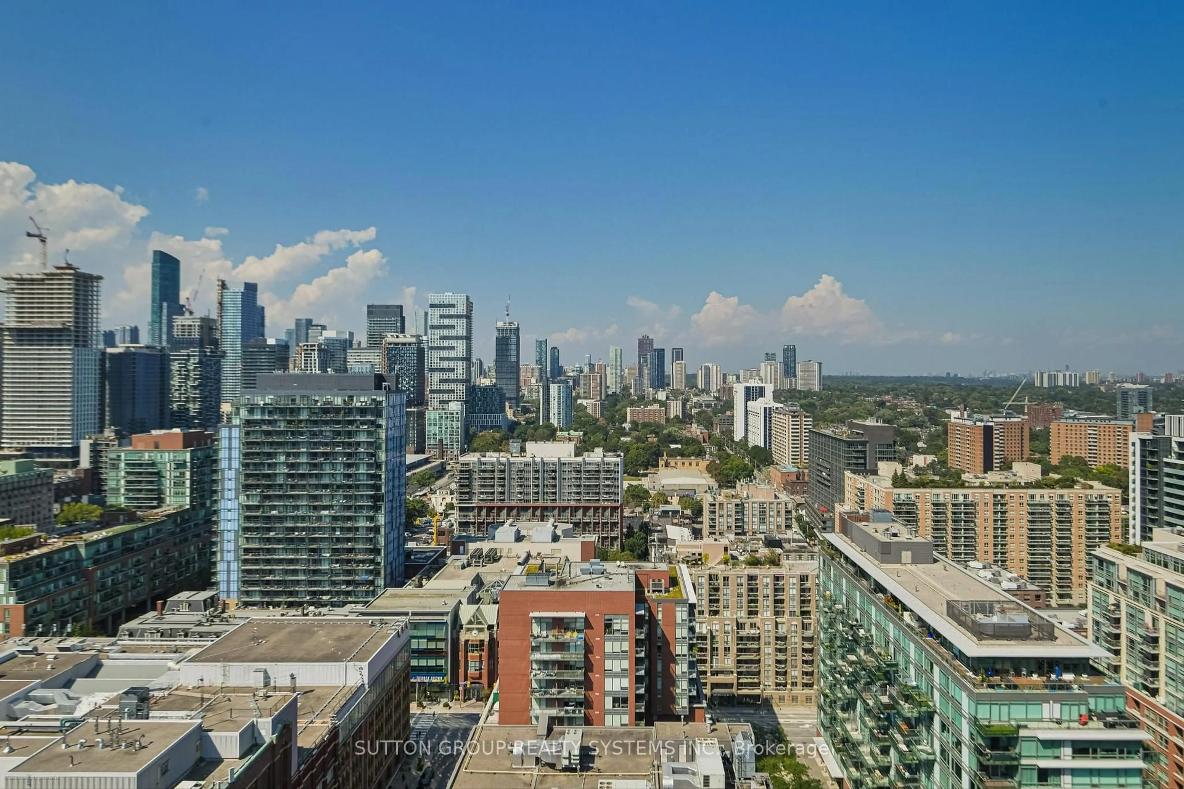 Patio, city buildings view from balcony for 158 Front St #2502, Toronto Ontario M5A 1E5