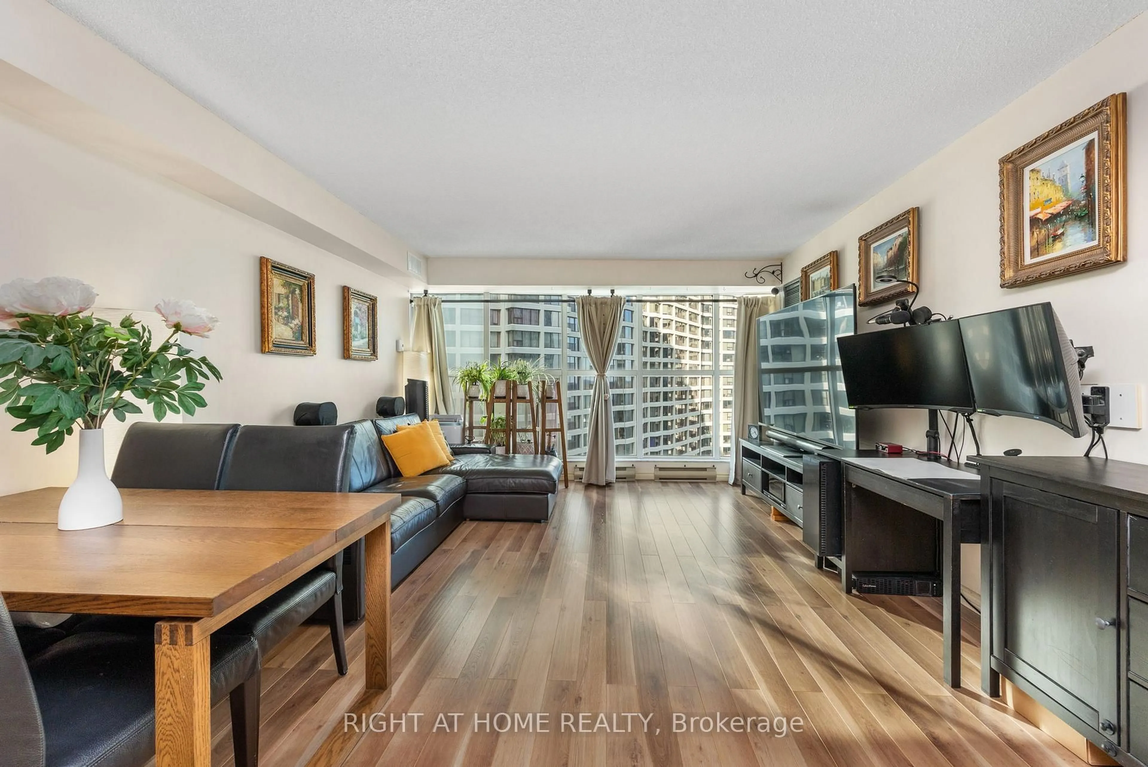 Living room with furniture, wood/laminate floor for 77 Harbour Sq #2306, Toronto Ontario M5J 2S2