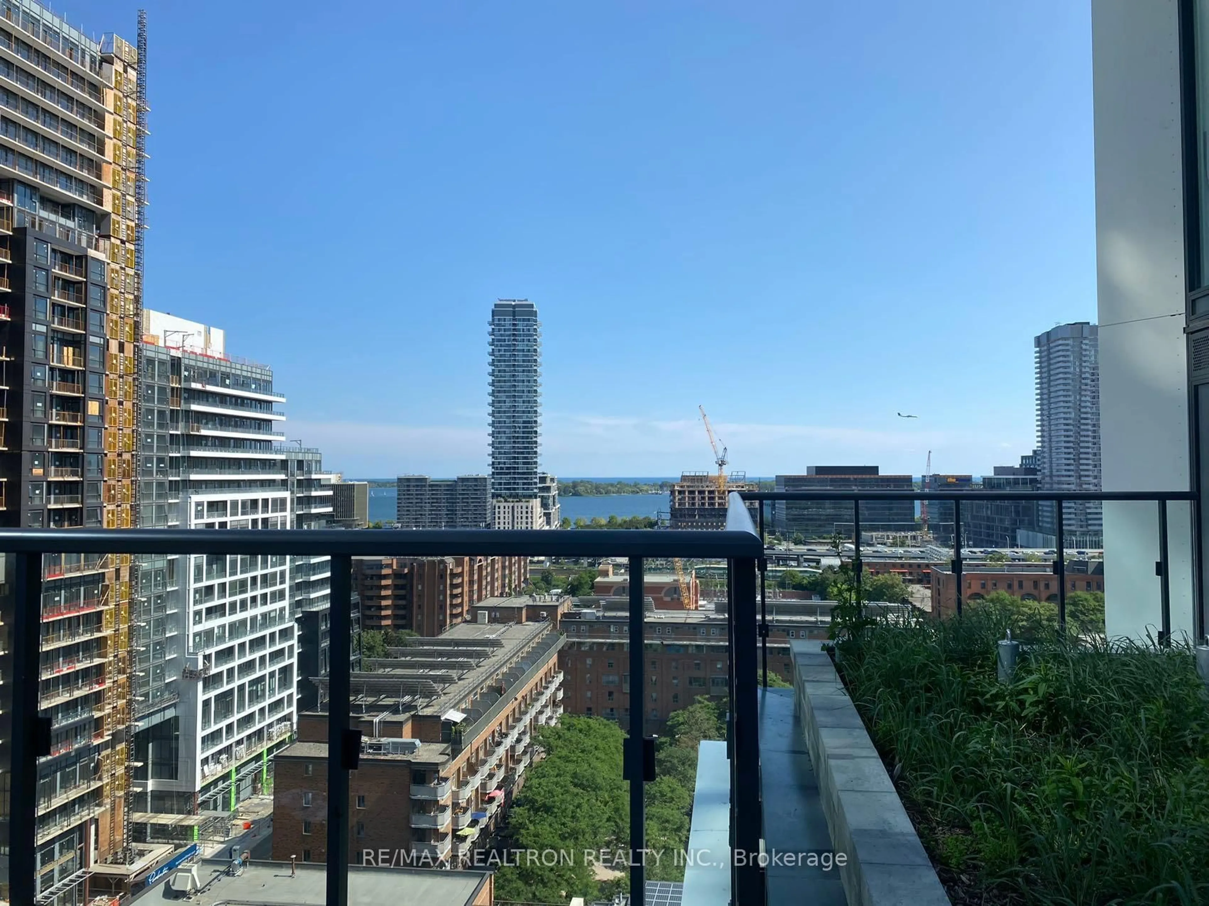 Balcony in the apartment, city buildings view from balcony for 158 Front St #203, Toronto Ontario M5A 0K9