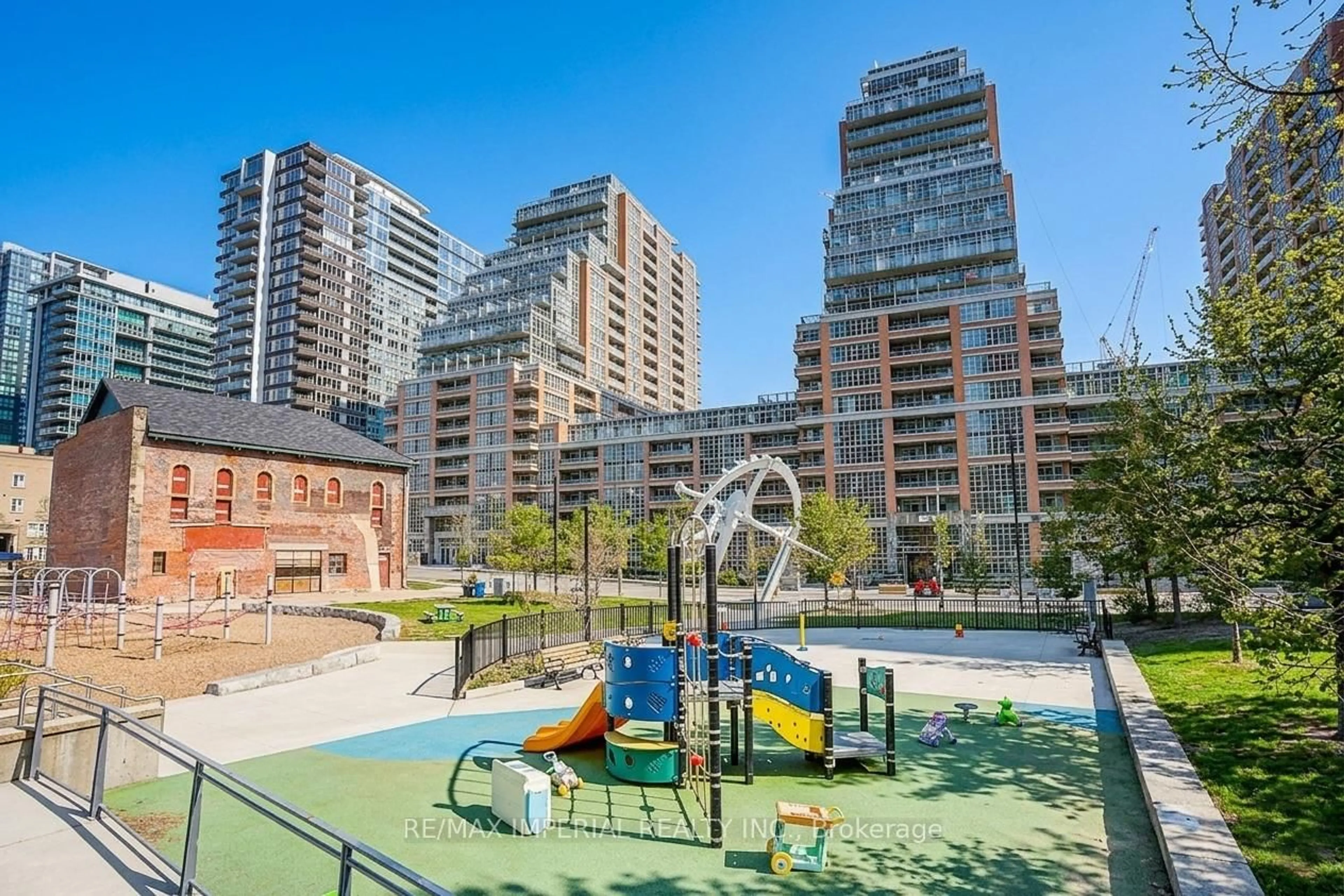 Patio, city buildings view from balcony for 65 East Liberty St #417, Toronto Ontario M6K 3R2