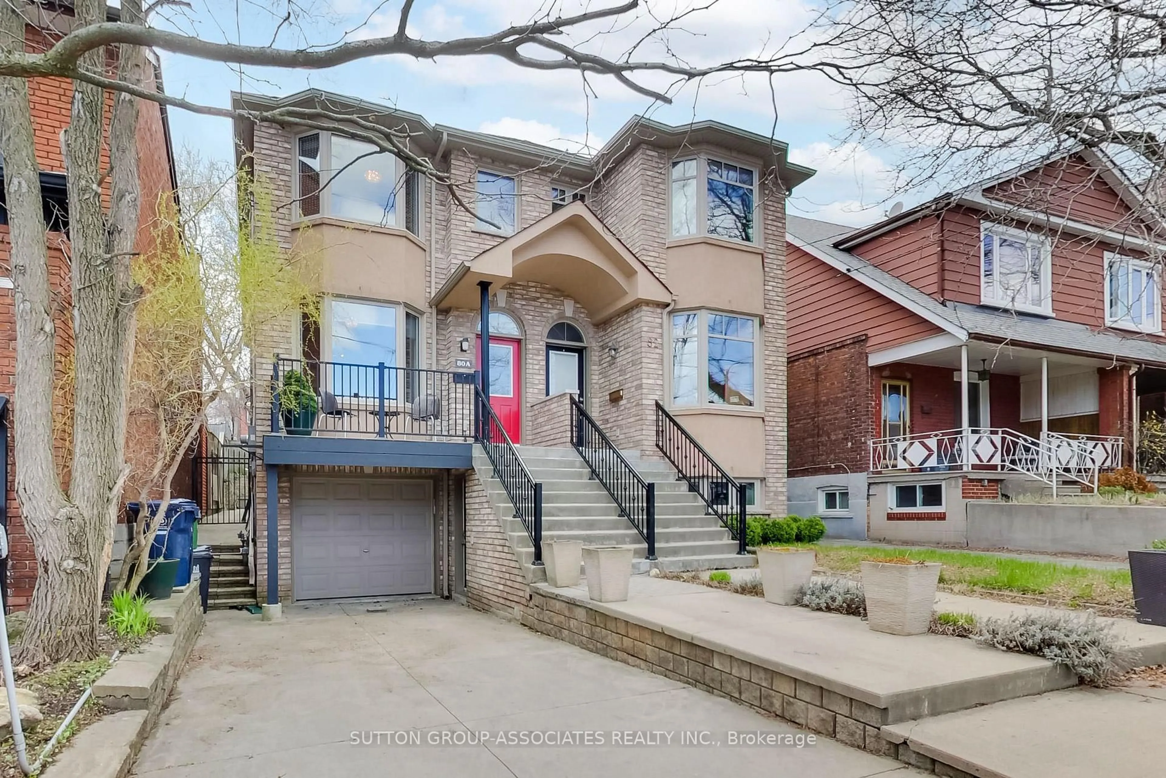 Home with brick exterior material, street for 80A Robina Ave, Toronto Ontario M6C 3Y7