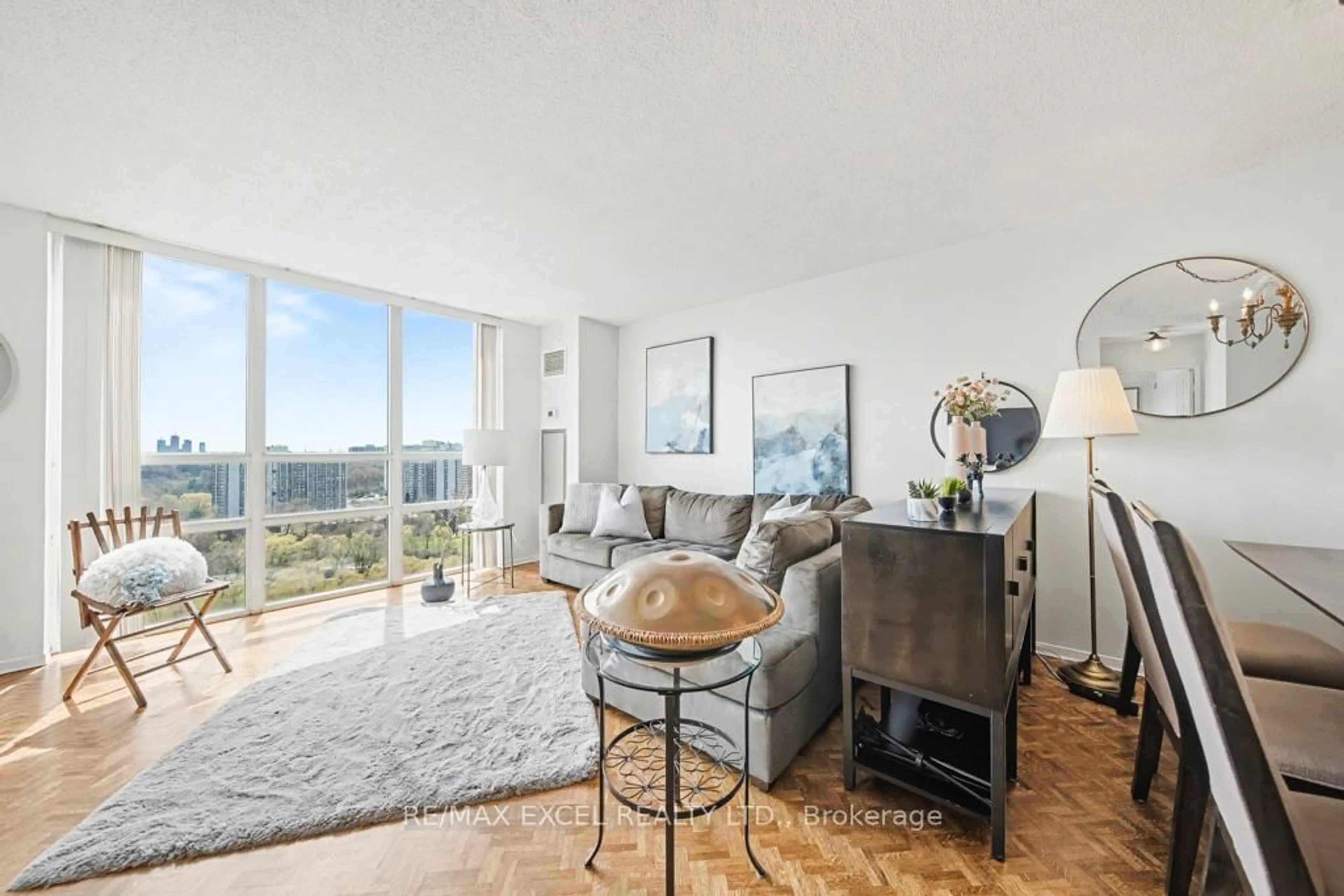 Living room with furniture, unknown for 215 Wynford Dr #1604, Toronto Ontario M3C 3P5