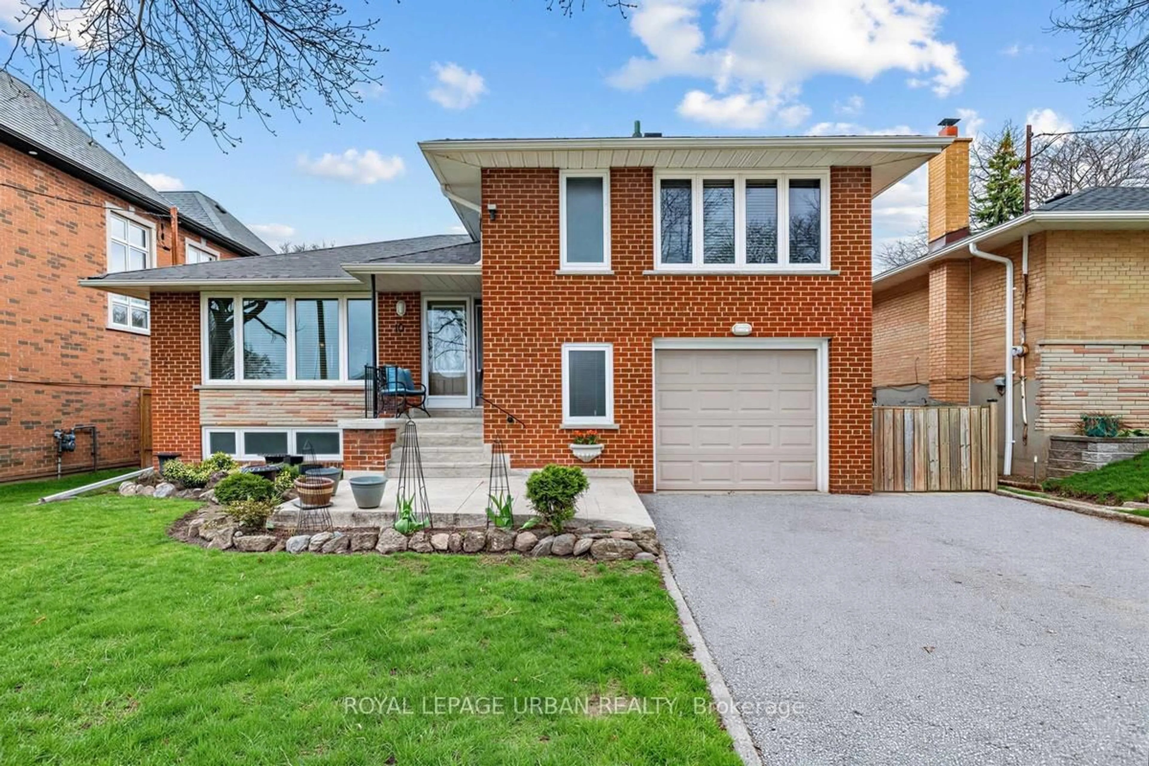 Home with brick exterior material, street for 10 Kenewen Crt, Toronto Ontario M4A 1R8