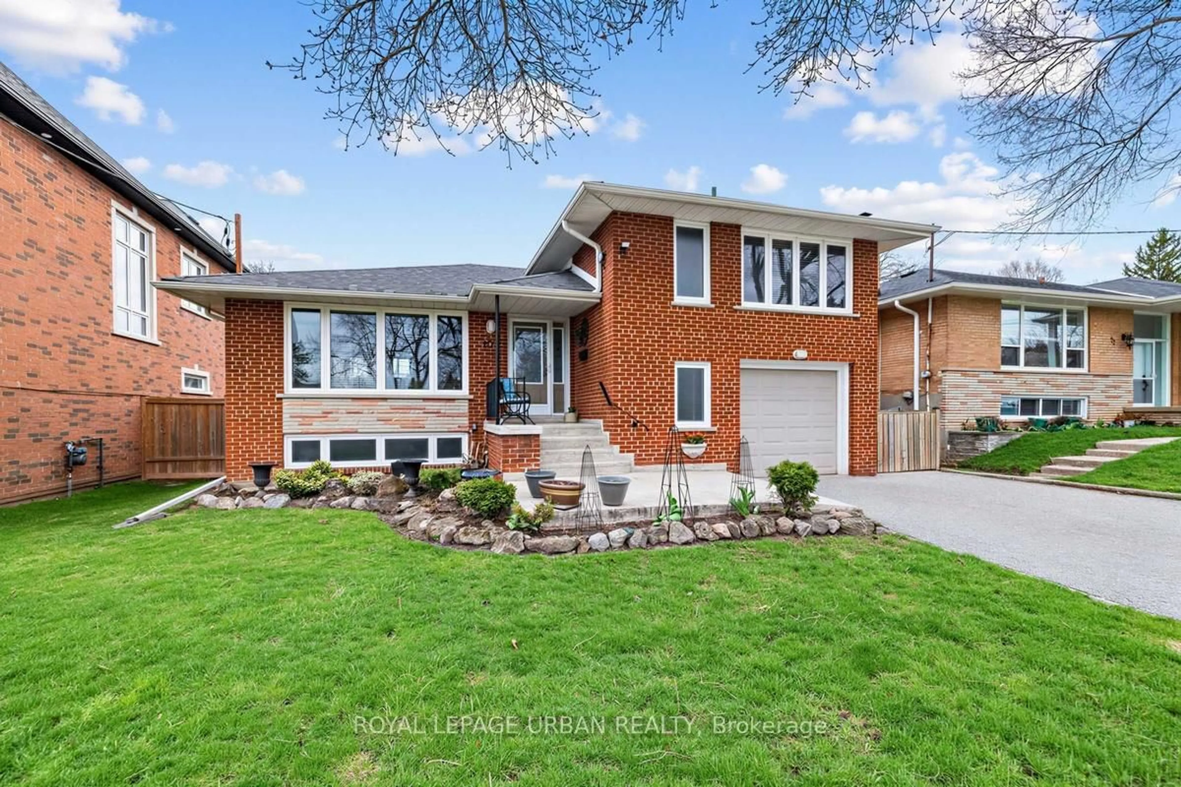 Home with brick exterior material, street for 10 Kenewen Crt, Toronto Ontario M4A 1R8