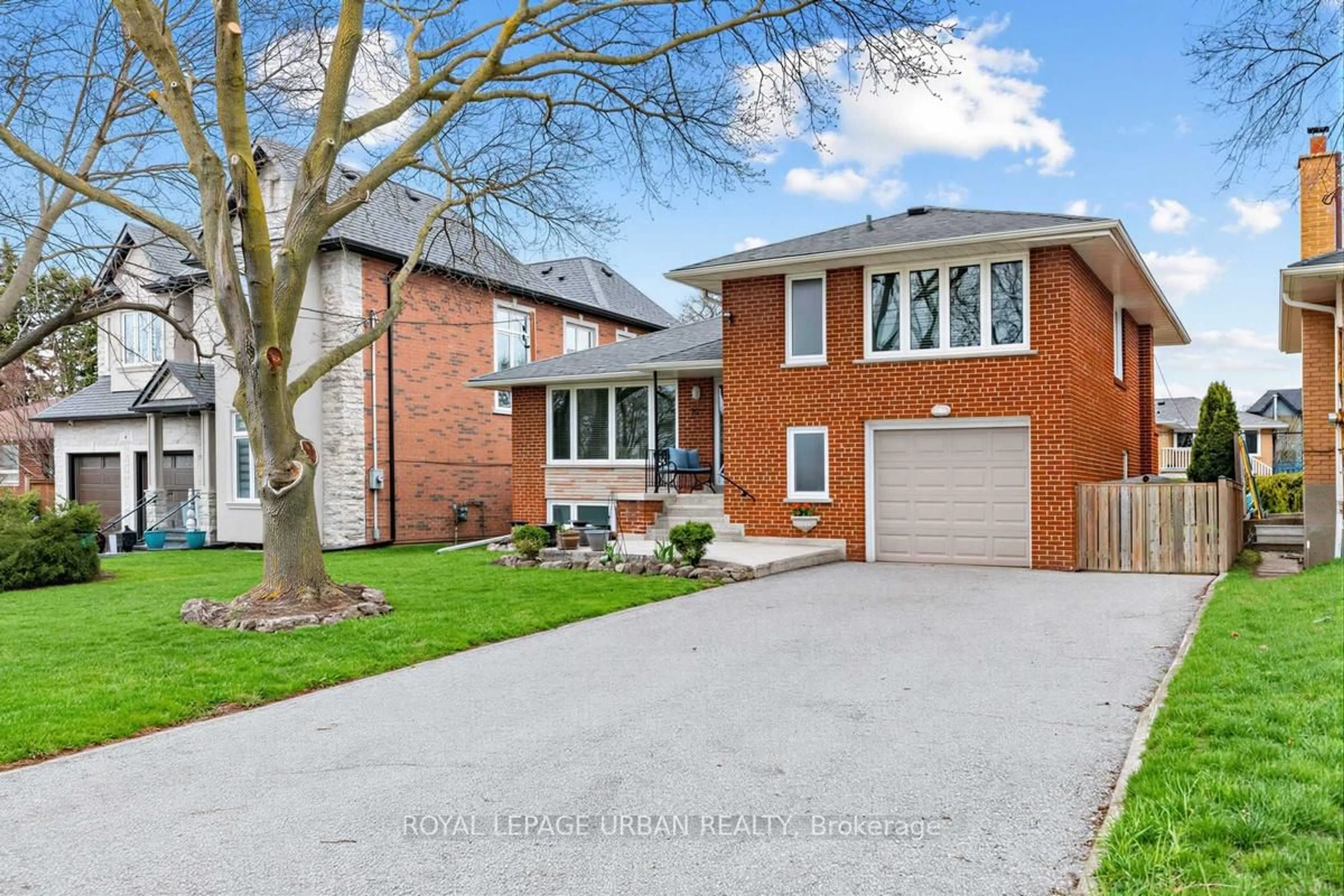 Home with brick exterior material, street for 10 Kenewen Crt, Toronto Ontario M4A 1R8