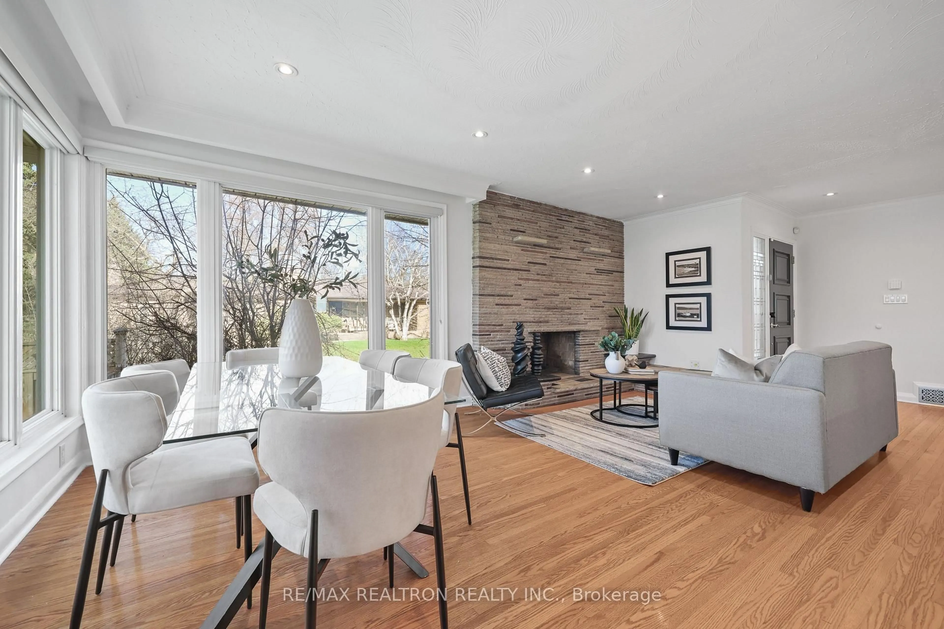 Living room with furniture, wood/laminate floor for 122 Hove St, Toronto Ontario M3H 4Z7