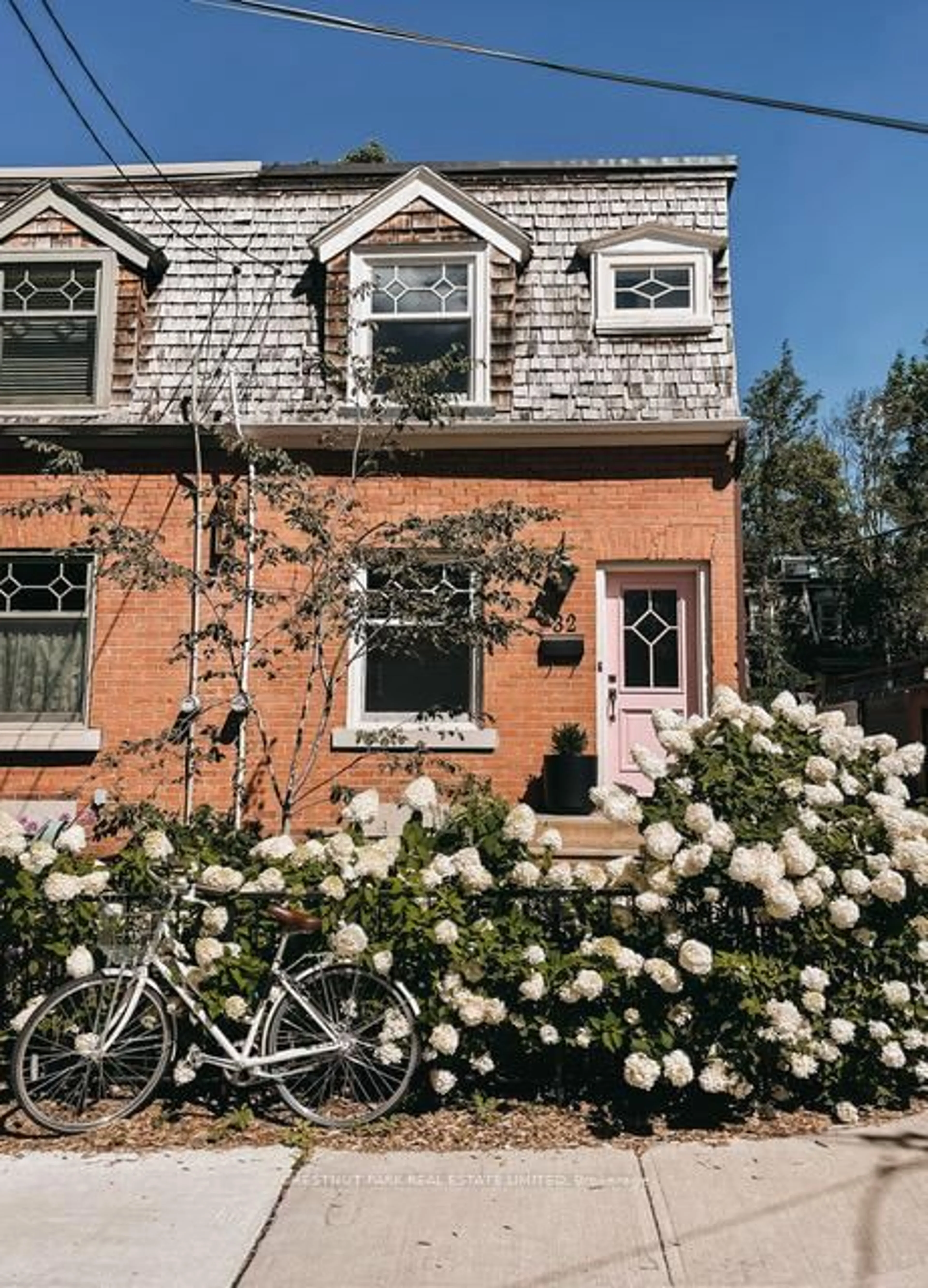 Home with brick exterior material, street for 32 Sackville Pl, Toronto Ontario M4X 1A4